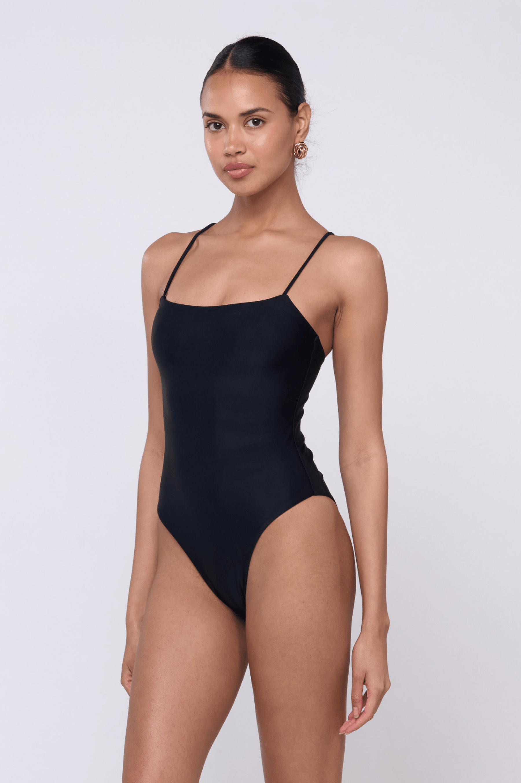 This is an image of Dominick One Piece in Black - RESA featuring a model wearing the dress