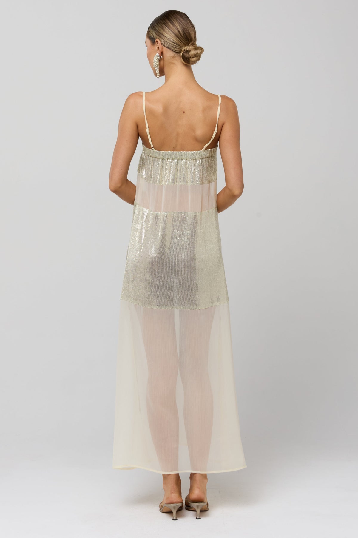 This is an image of Eli Gold Panel Dress - RESA featuring a model wearing the dress