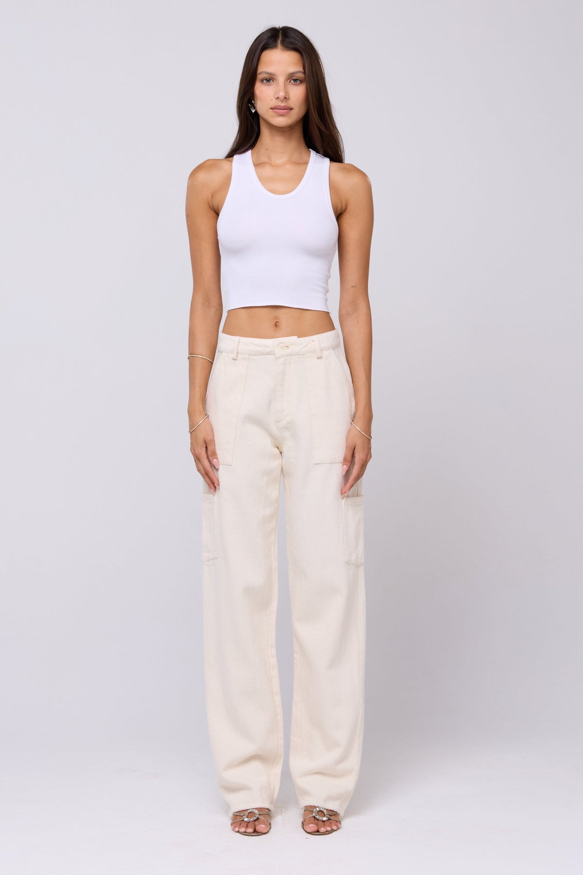 This is an image of Elsa Cargo Pant in Cream - RESA featuring a model wearing the dress