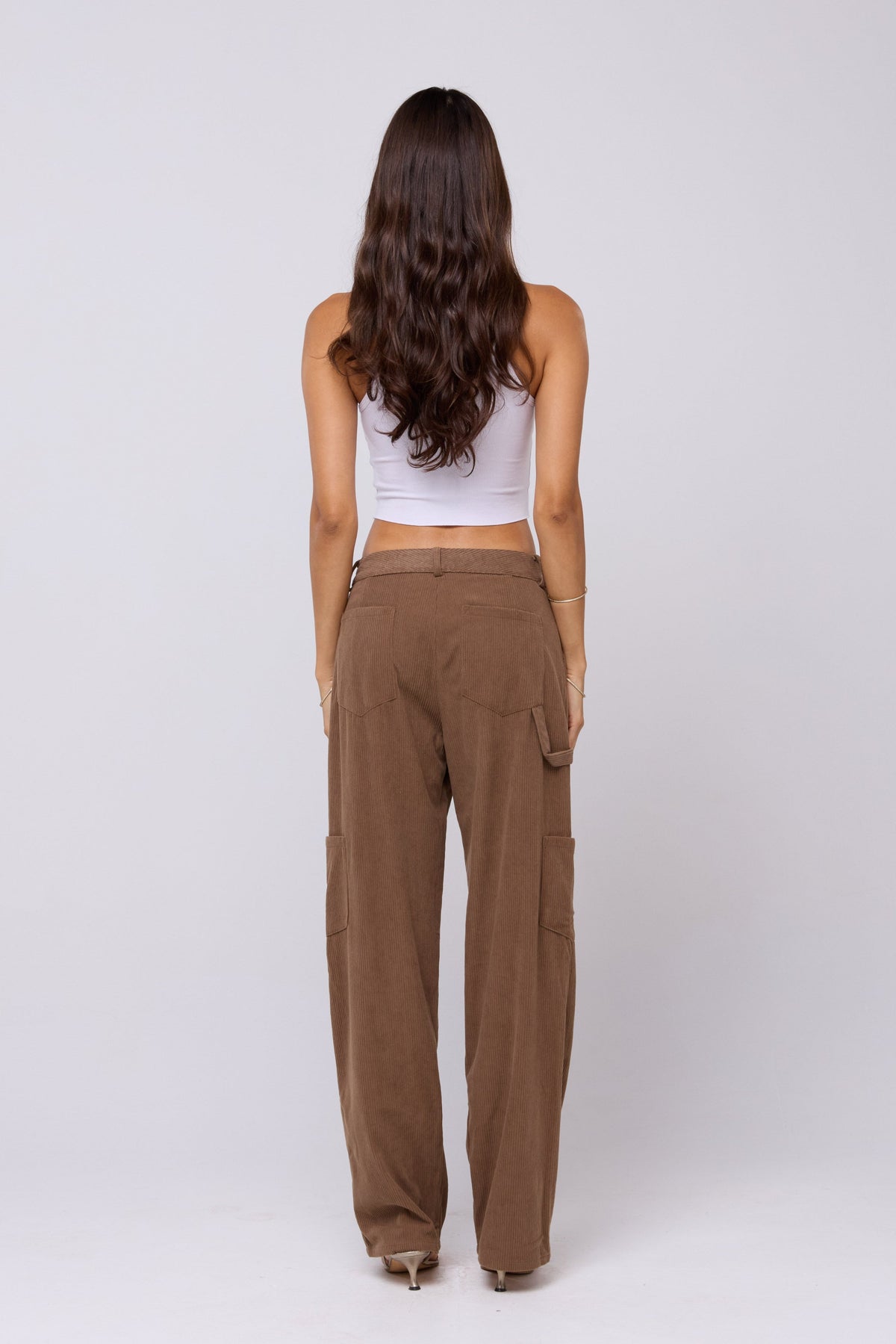 This is an image of Elsa Cargo Pant in Espresso - RESA featuring a model wearing the dress
