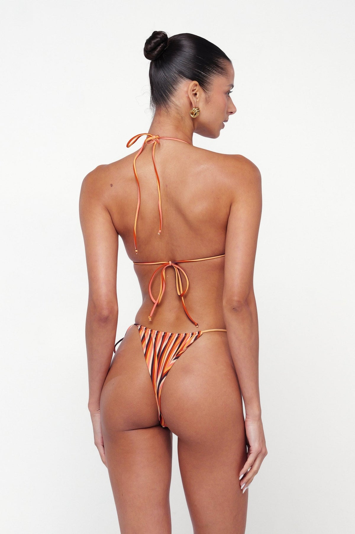 This is an image of Ernie Bikini Bottom in Studio 54 - RESA featuring a model wearing the dress