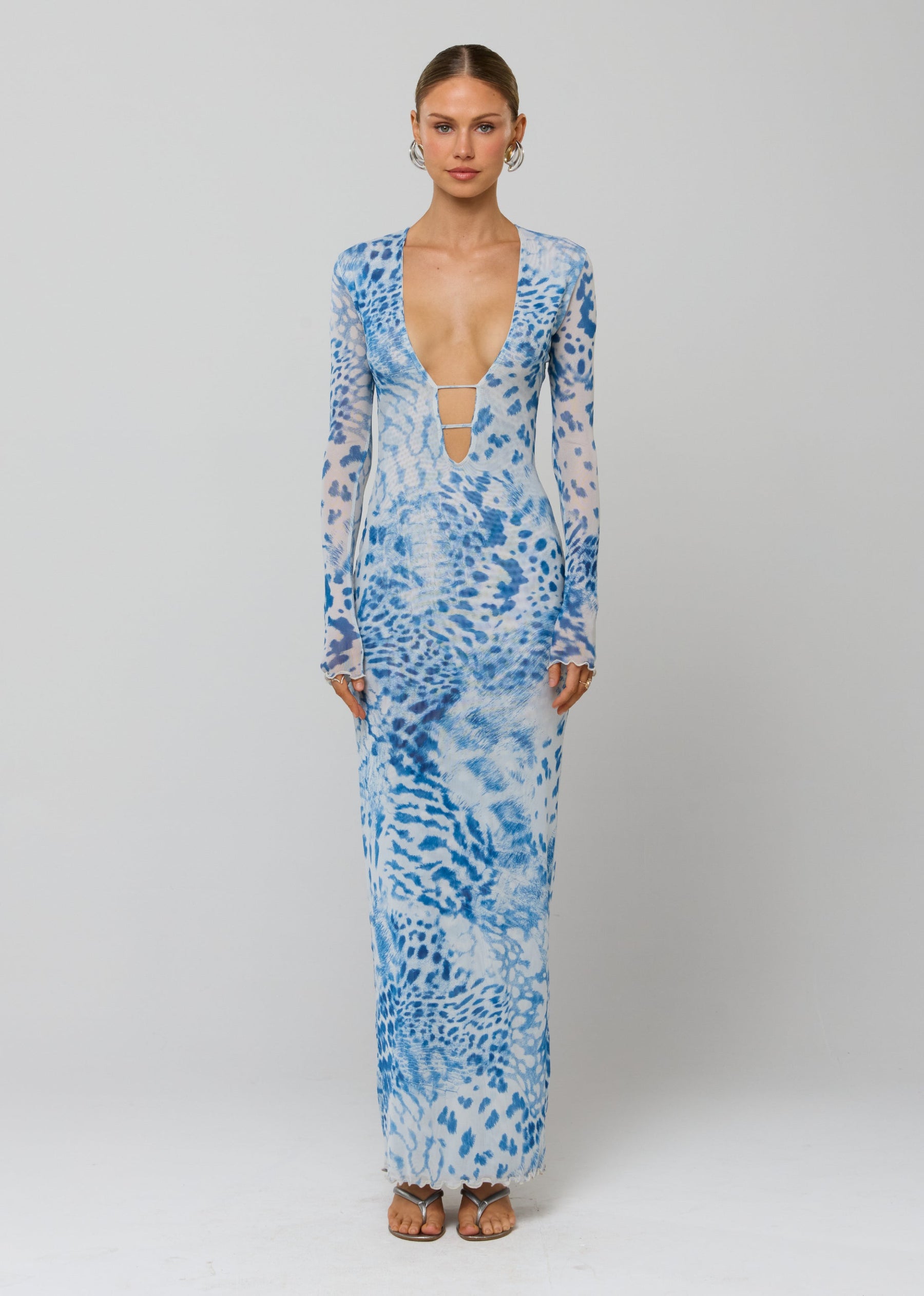 This is an image of Esme Dress in Neve - RESA featuring a model wearing the dress