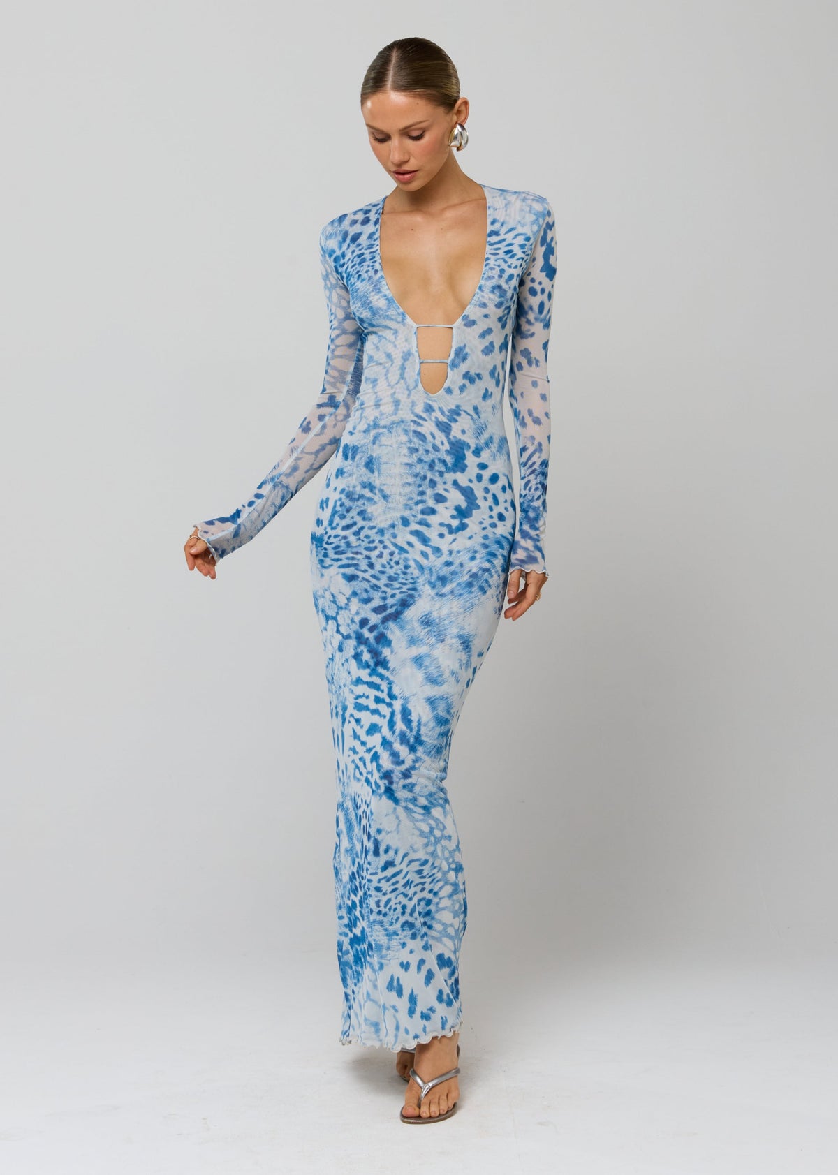 This is an image of Esme Dress in Neve - RESA featuring a model wearing the dress