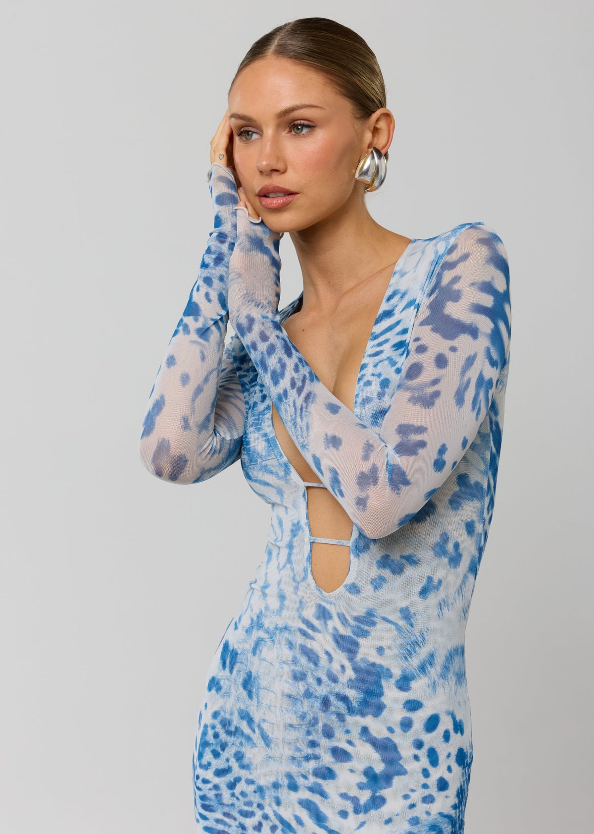 This is an image of Esme Dress in Neve - RESA featuring a model wearing the dress