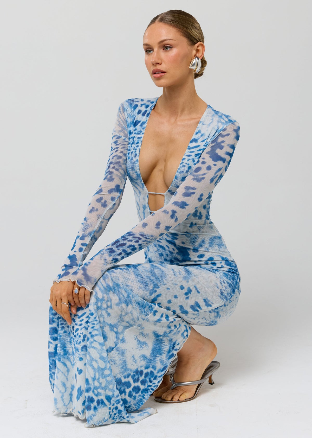 This is an image of Esme Dress in Neve - RESA featuring a model wearing the dress