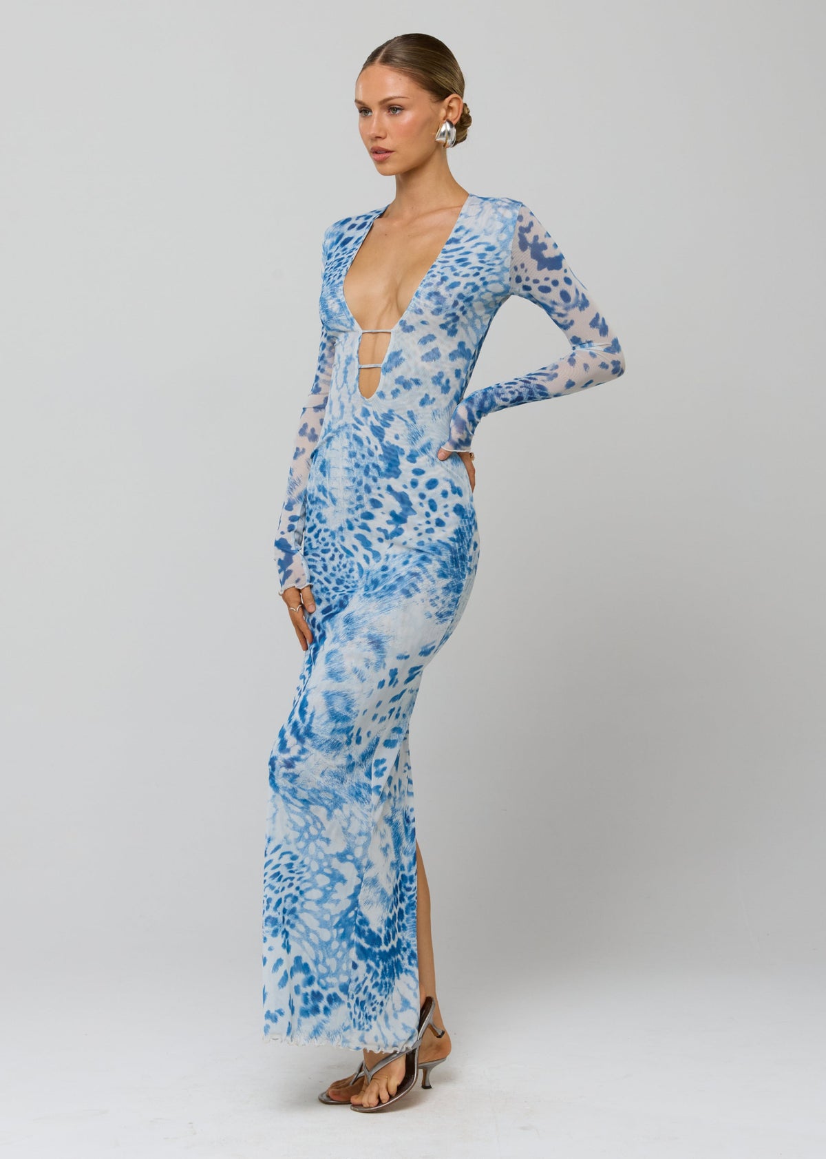 This is an image of Esme Dress in Neve - RESA featuring a model wearing the dress