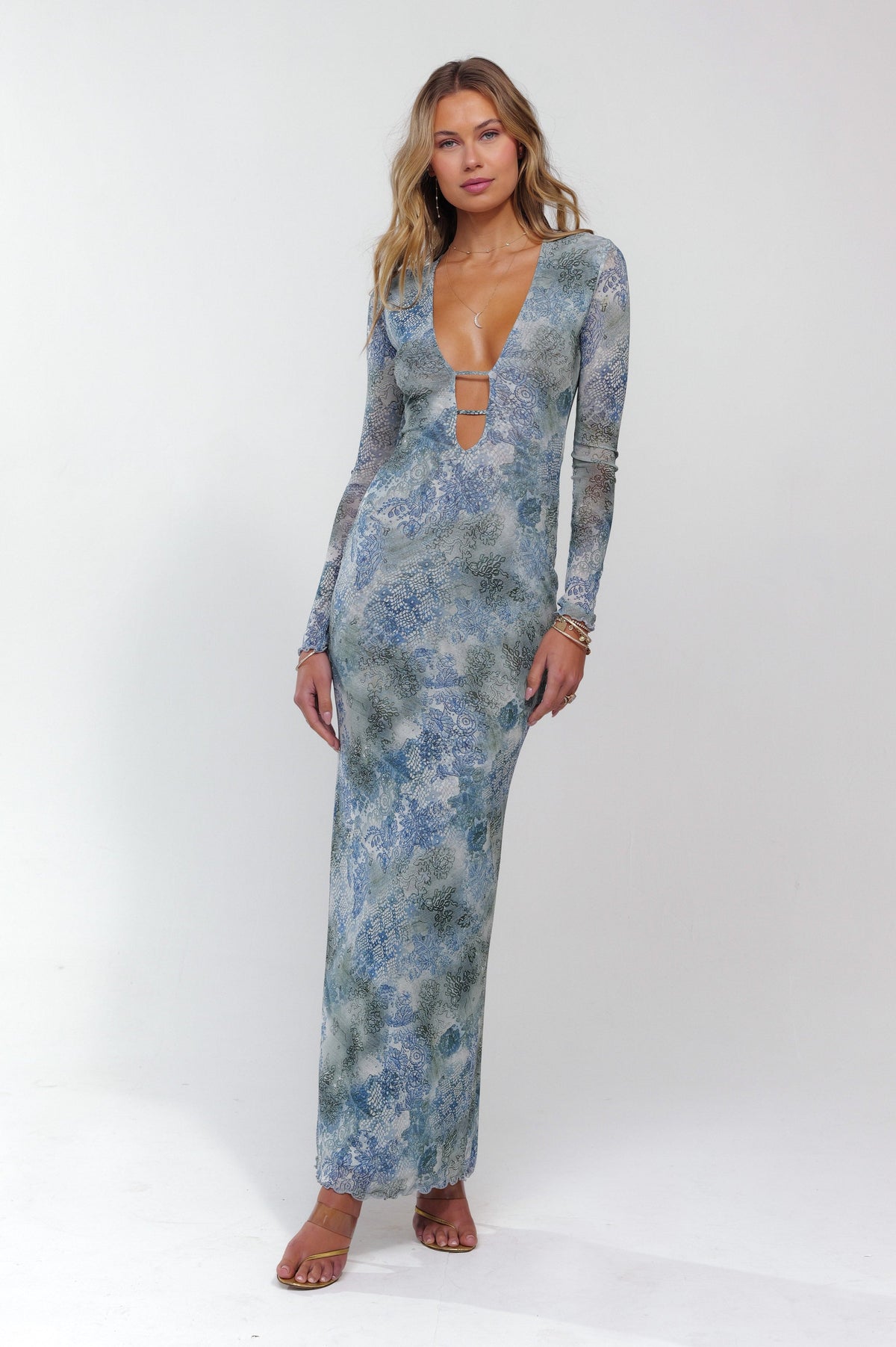 This is an image of Esme Dress in Siren - RESA featuring a model wearing the dress