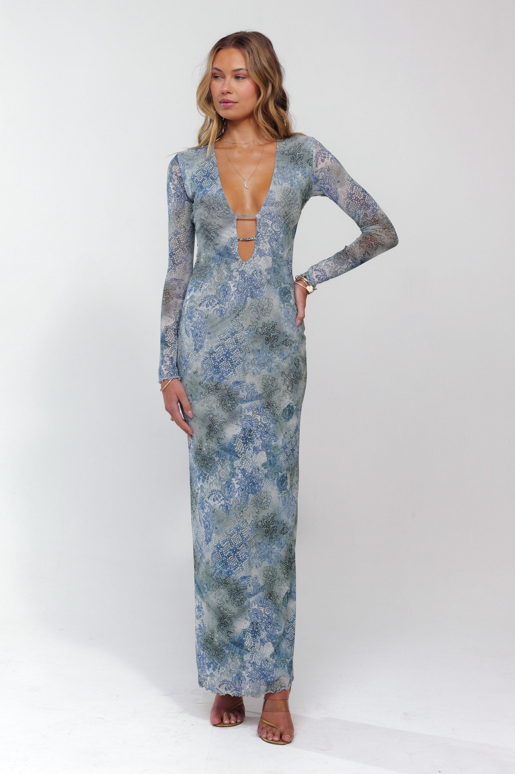 This is an image of Esme Dress in Siren - RESA featuring a model wearing the dress