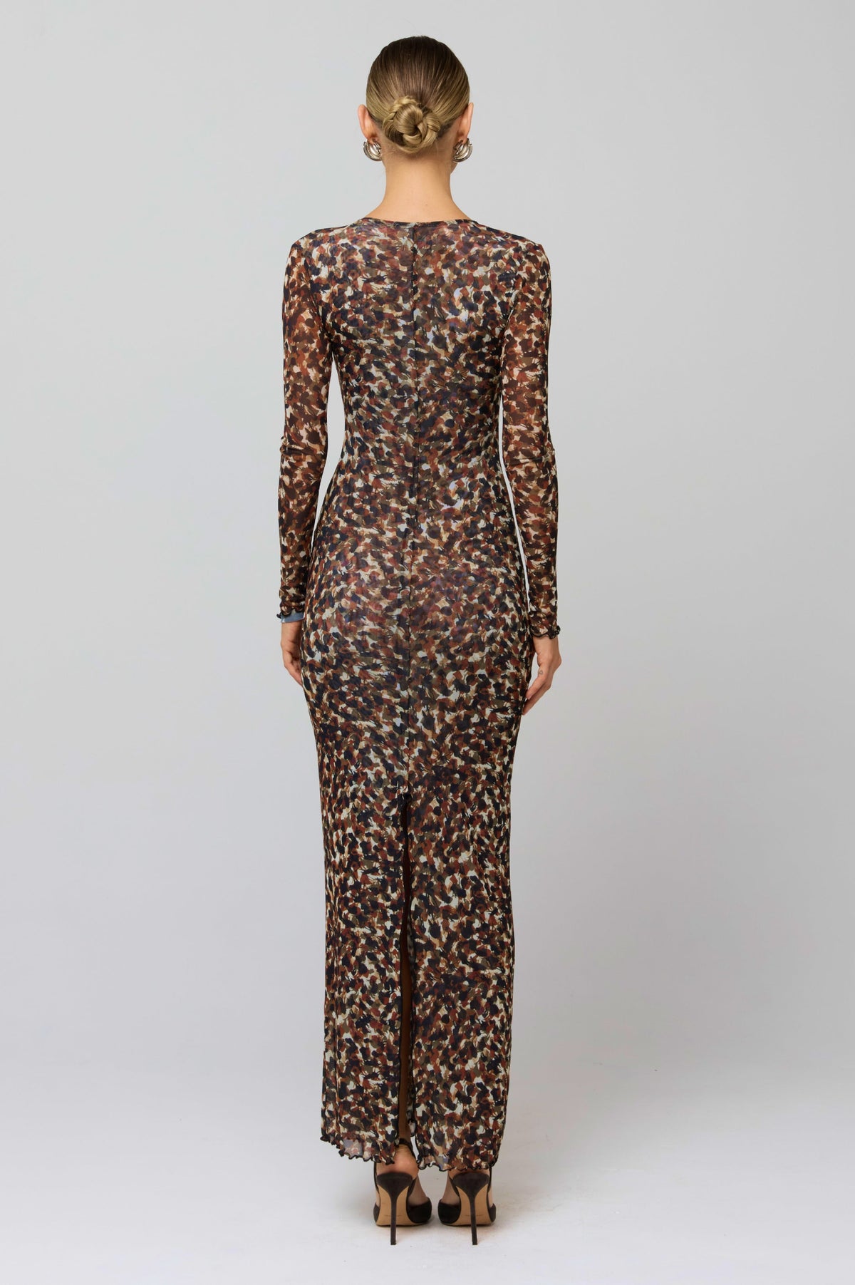 This is an image of Esme Dress in Terra - RESA featuring a model wearing the dress