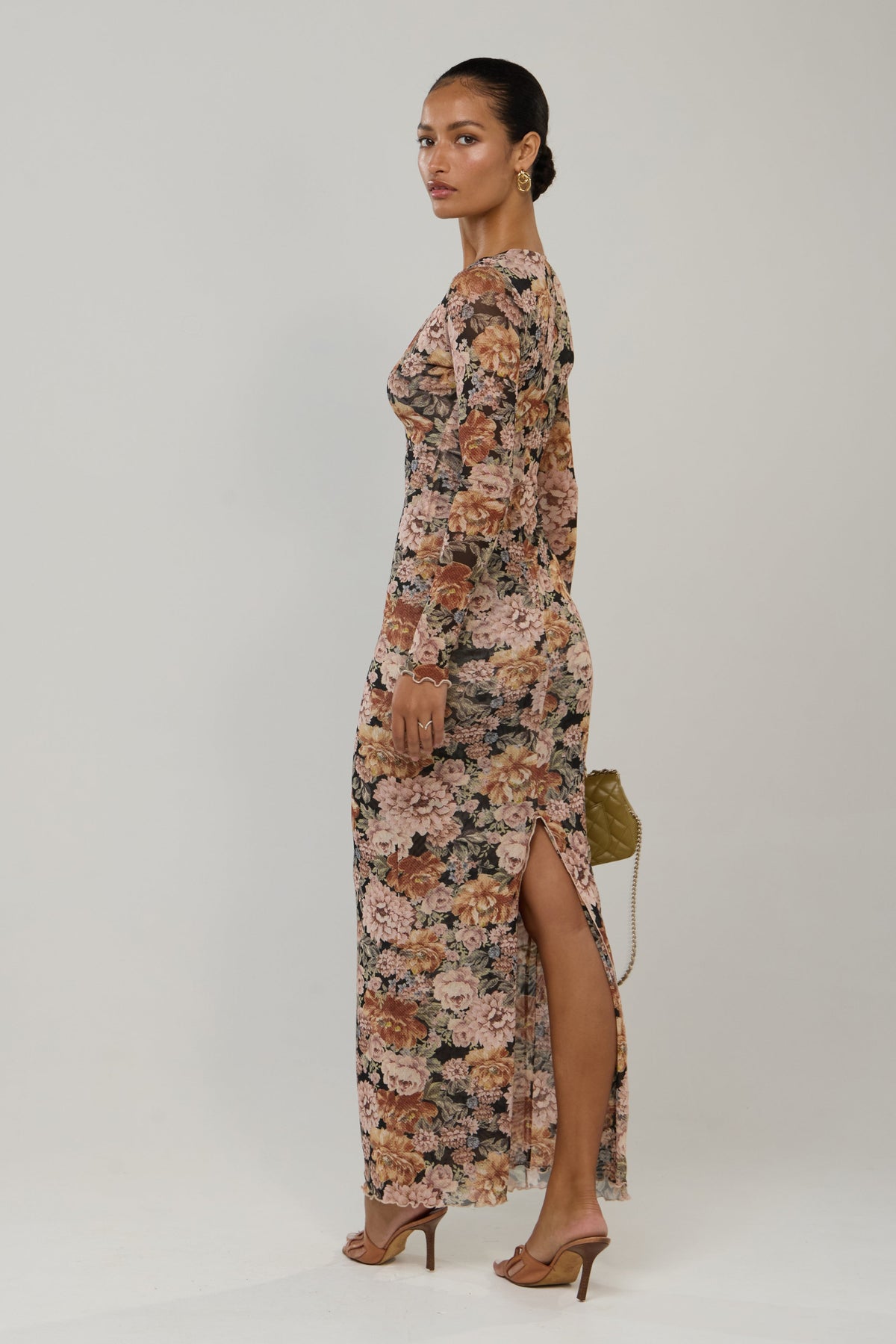 This is an image of Esme in Antique - RESA featuring a model wearing the dress