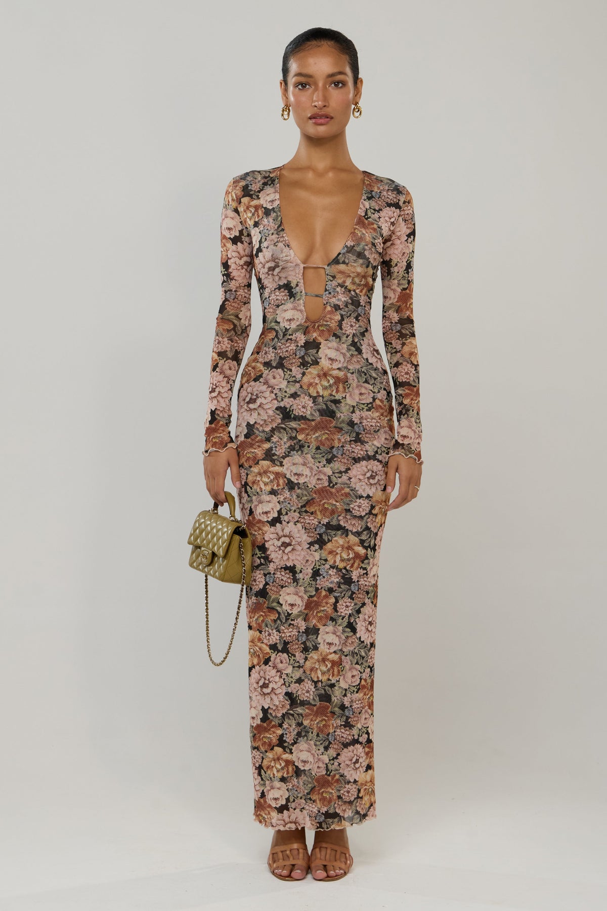 This is an image of Esme in Antique - RESA featuring a model wearing the dress