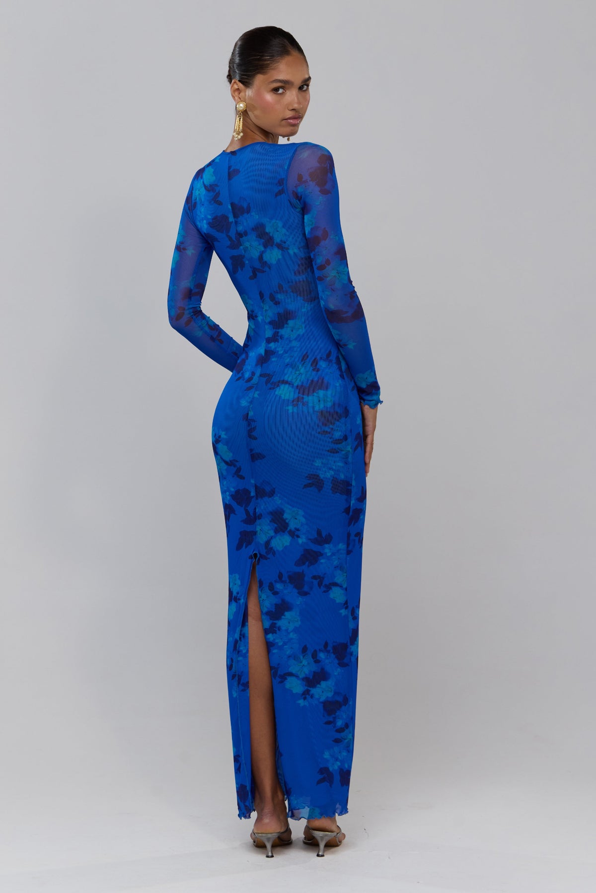 This is an image of Esme in Azul - RESA featuring a model wearing the dress