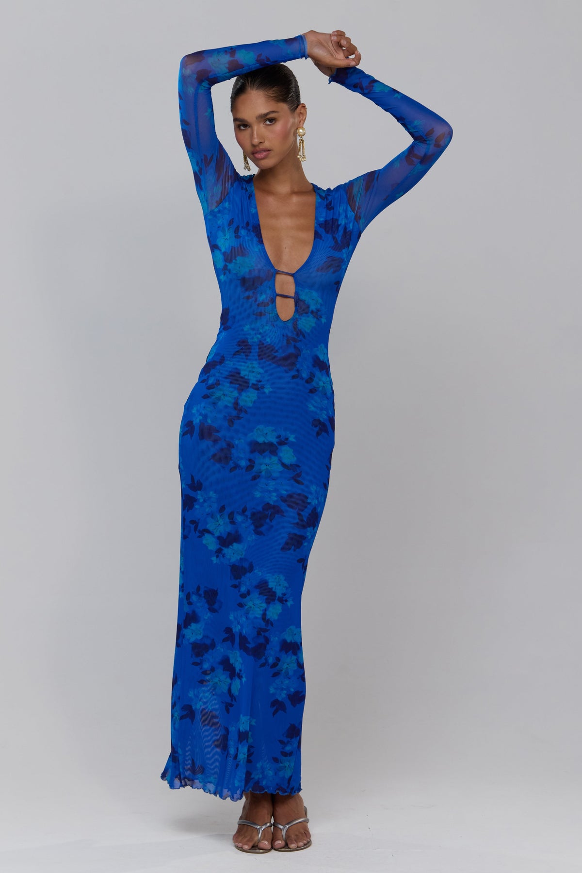 This is an image of Esme in Azul - RESA featuring a model wearing the dress