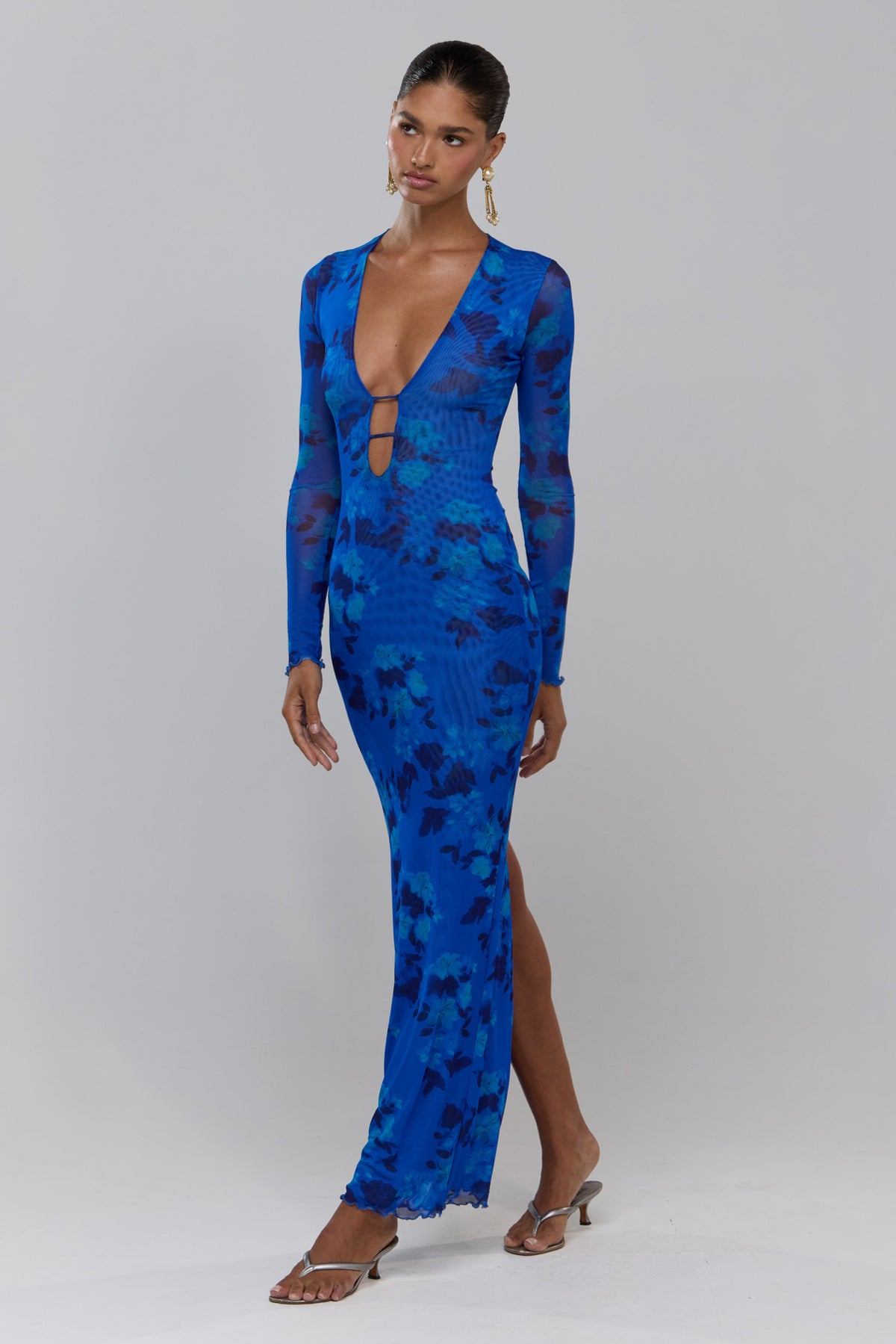 This is an image of Esme in Azul - RESA featuring a model wearing the dress