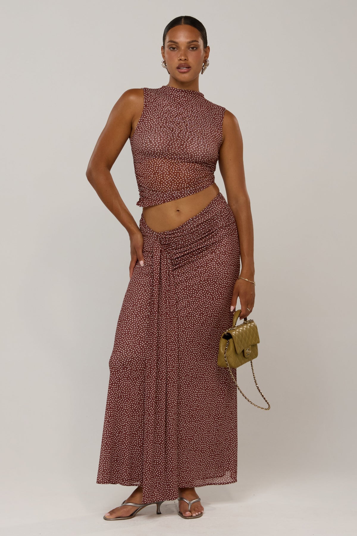 This is an image of Estelle in Coco Vanilla - RESA featuring a model wearing the dress