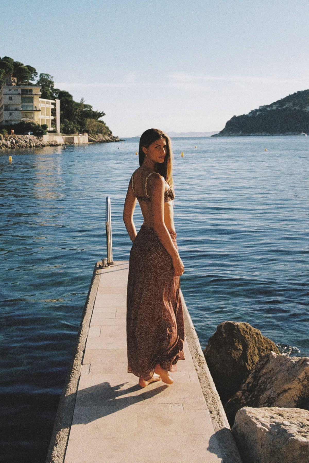 This is an image of Estelle in Coco Vanilla - RESA featuring a model wearing the dress