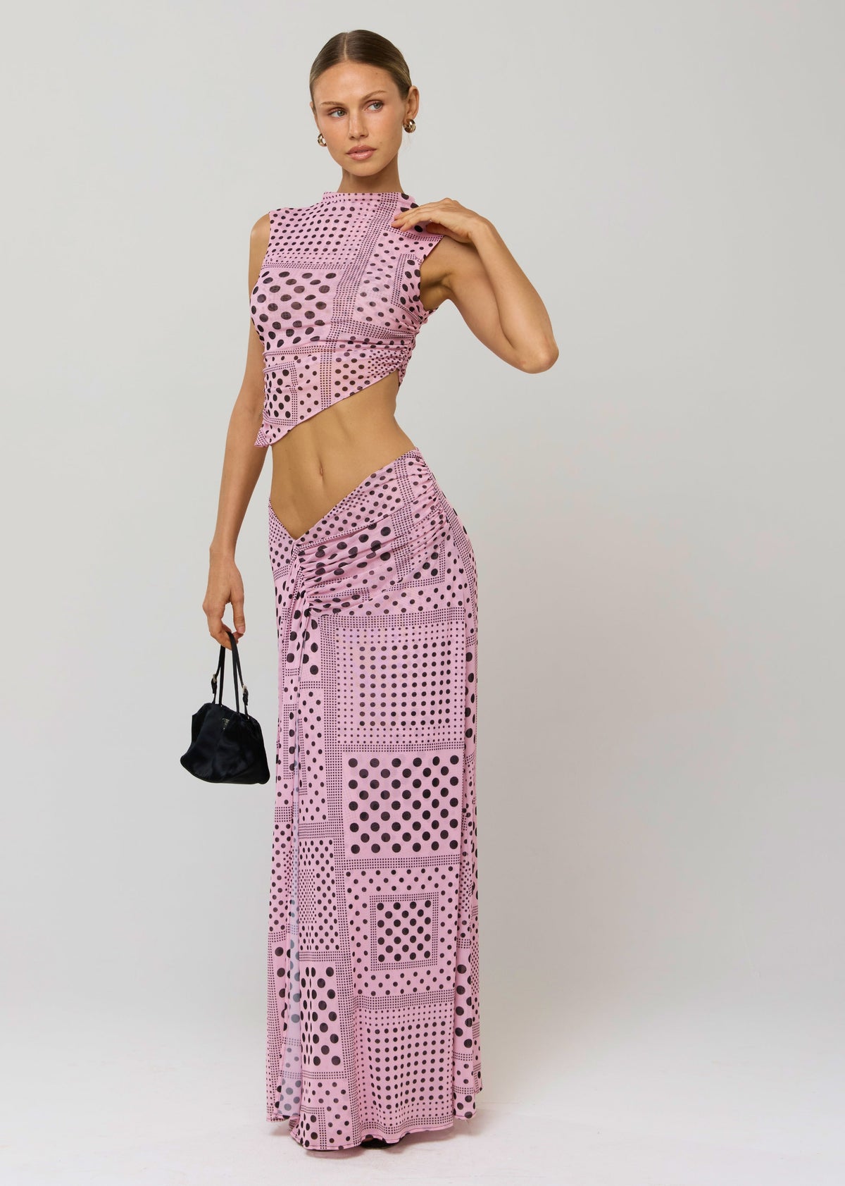 This is an image of Estelle Skirt in Lauper - RESA featuring a model wearing the dress