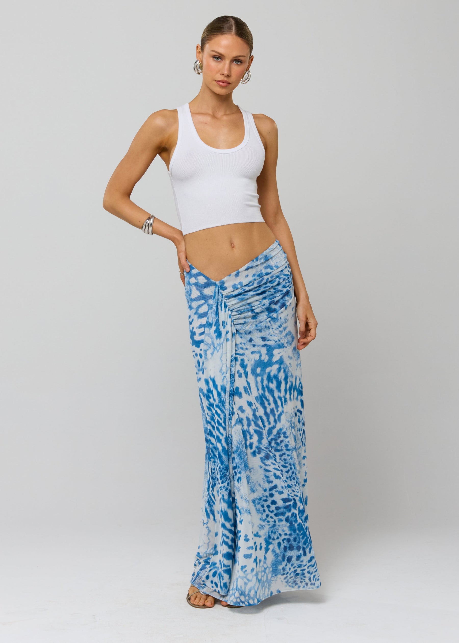 This is an image of Estelle Skirt in Neve - RESA featuring a model wearing the dress