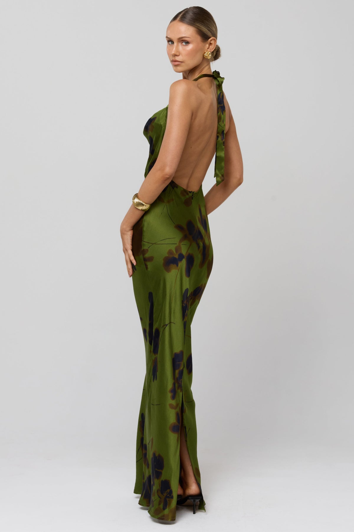 This is an image of Fiona Dress in Evergreen - RESA featuring a model wearing the dress