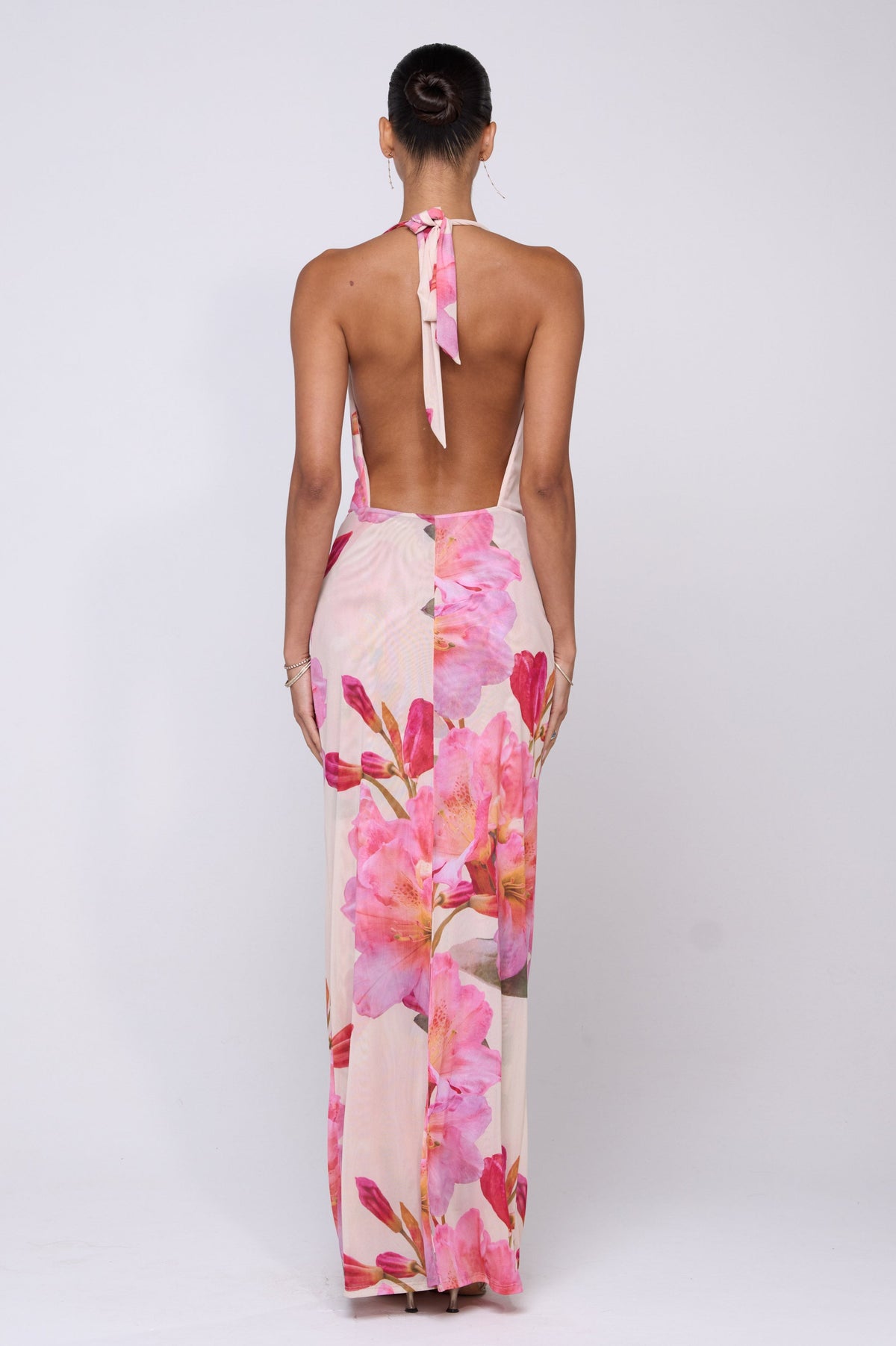 This is an image of Fiona Dress in Lily - RESA featuring a model wearing the dress