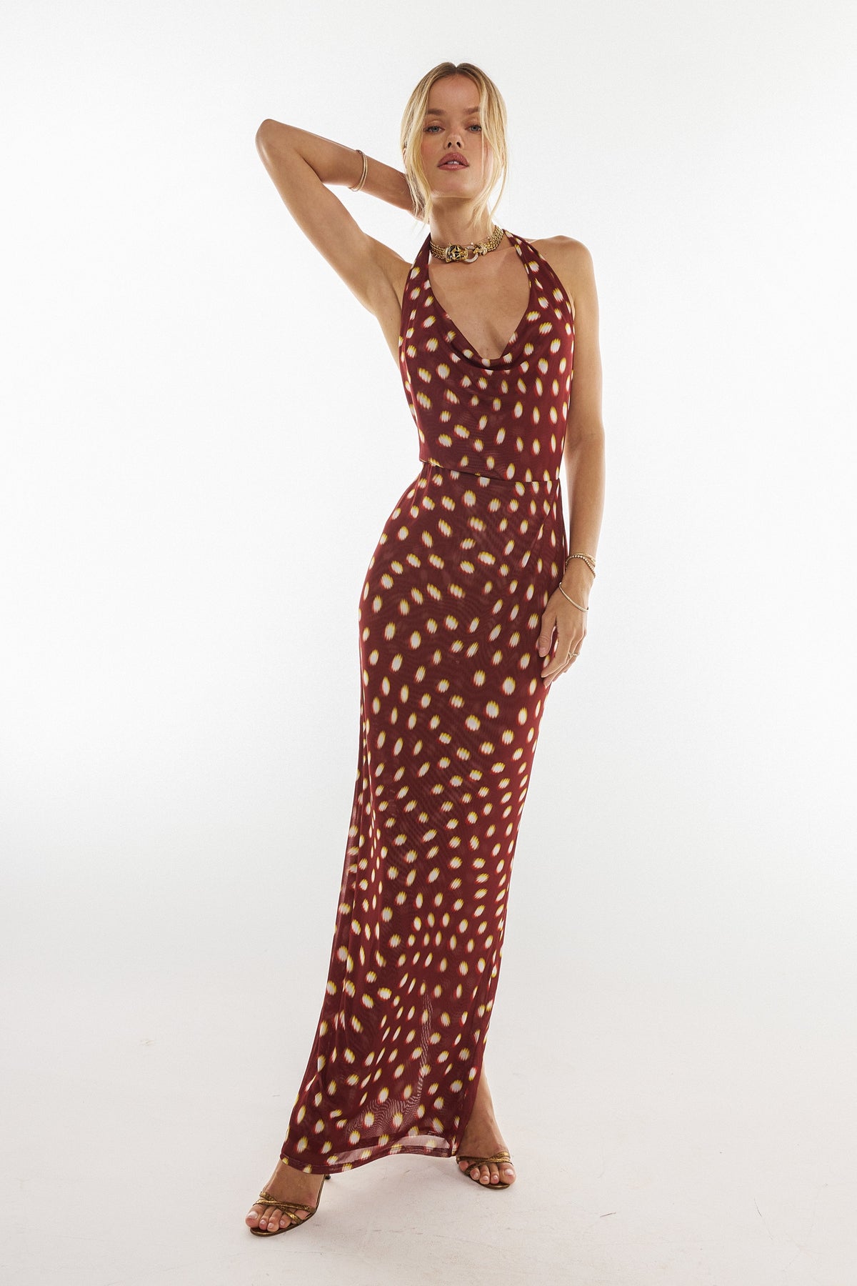 This is an image of Fiona Dress in Spice - RESA featuring a model wearing the dress