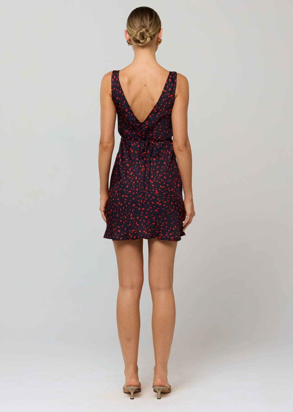 This is an image of Frankie Mini in Rouge - RESA featuring a model wearing the dress