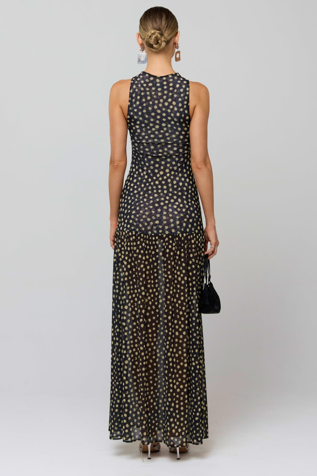 This is an image of Frida Dress in Celeste - RESA featuring a model wearing the dress