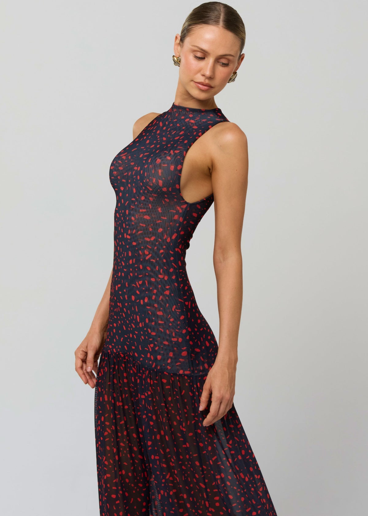 This is an image of Frida Dress in Rouge - RESA featuring a model wearing the dress