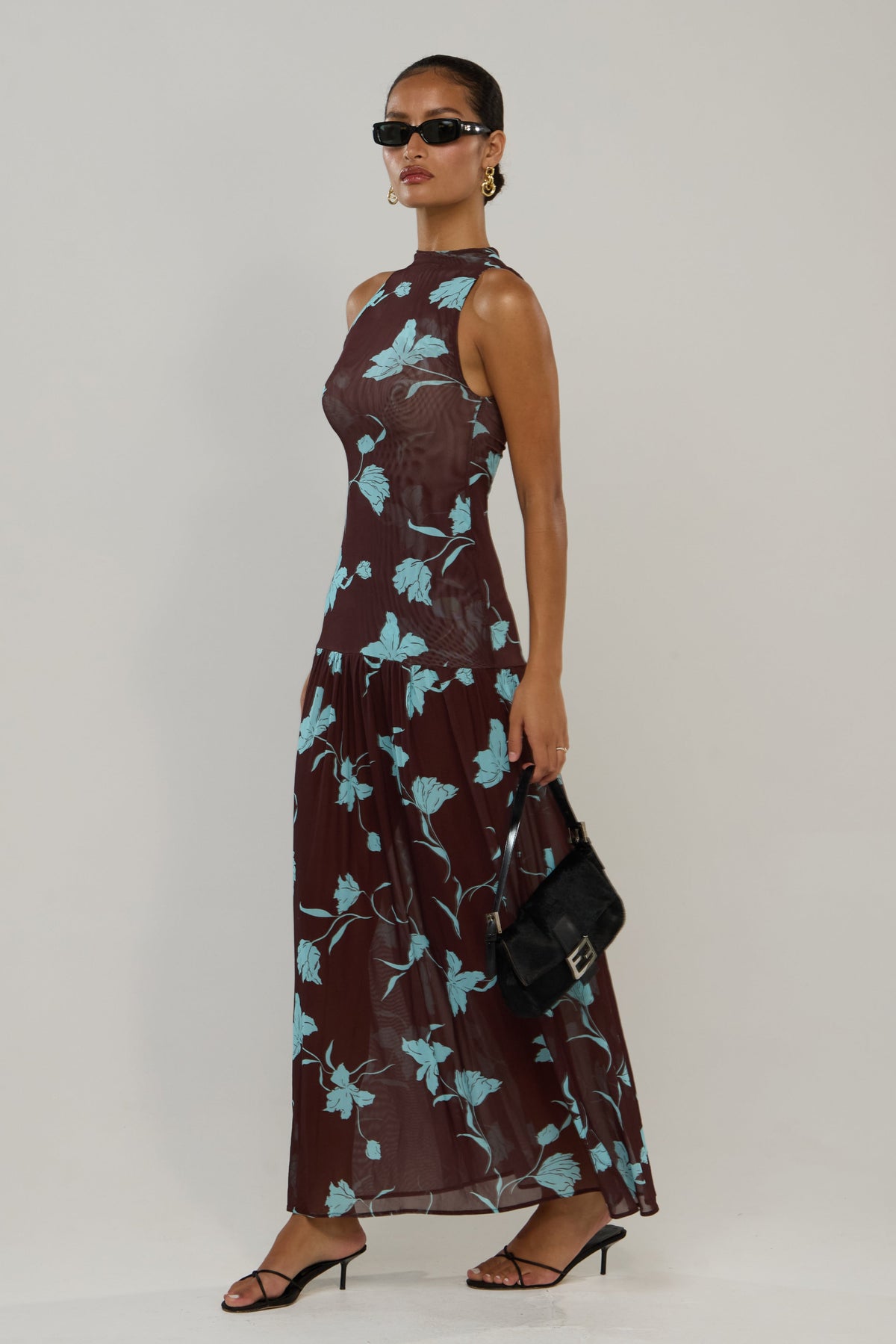 This is an image of Frida in Agave - RESA featuring a model wearing the dress