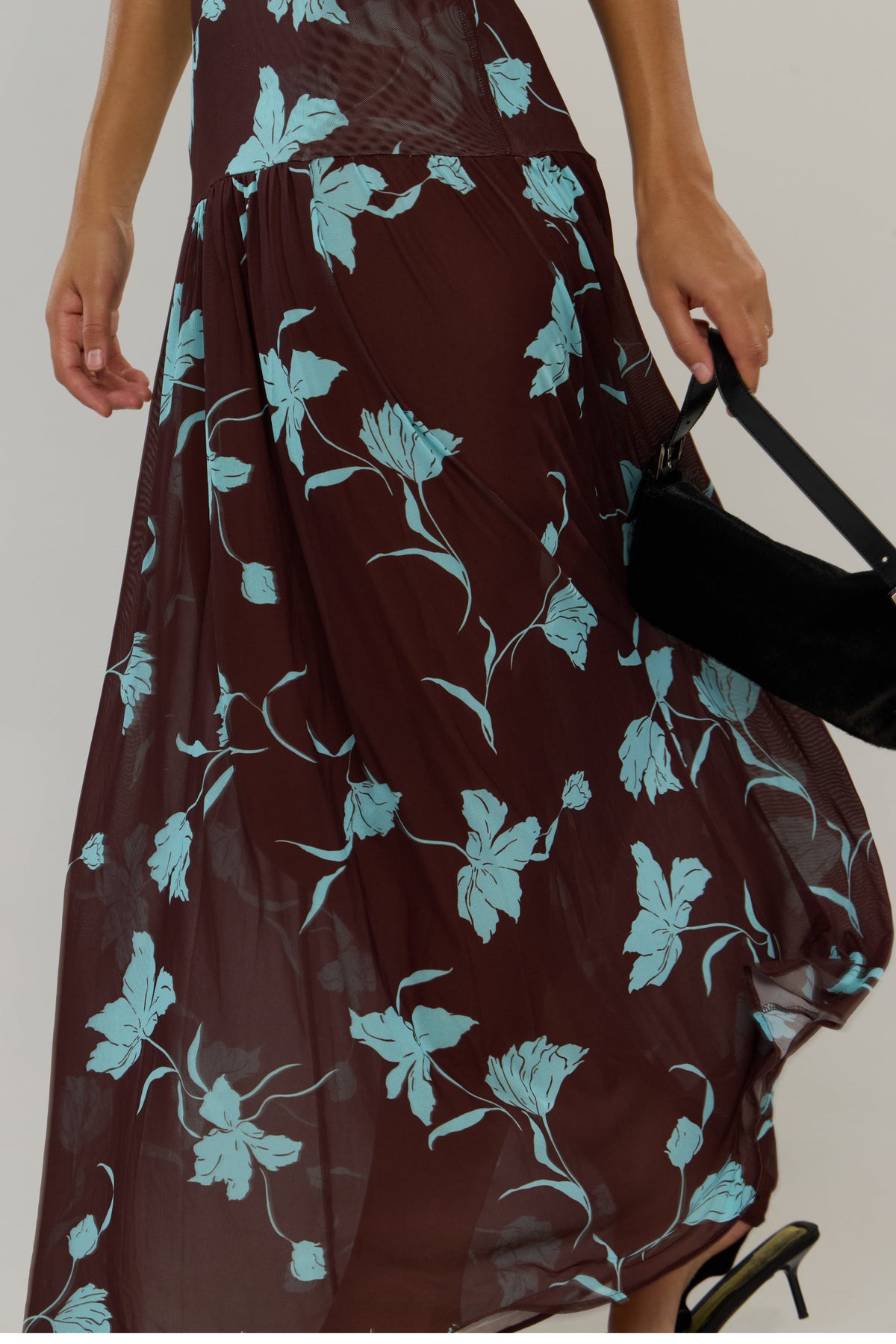 This is an image of Frida in Agave - RESA featuring a model wearing the dress