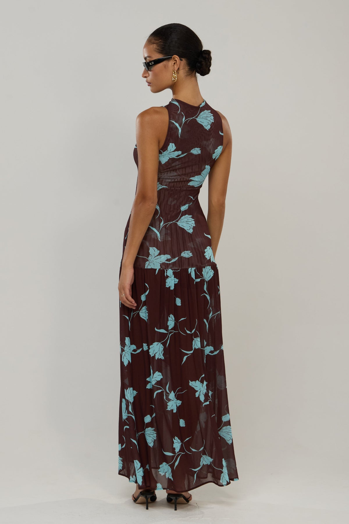 This is an image of Frida in Agave - RESA featuring a model wearing the dress
