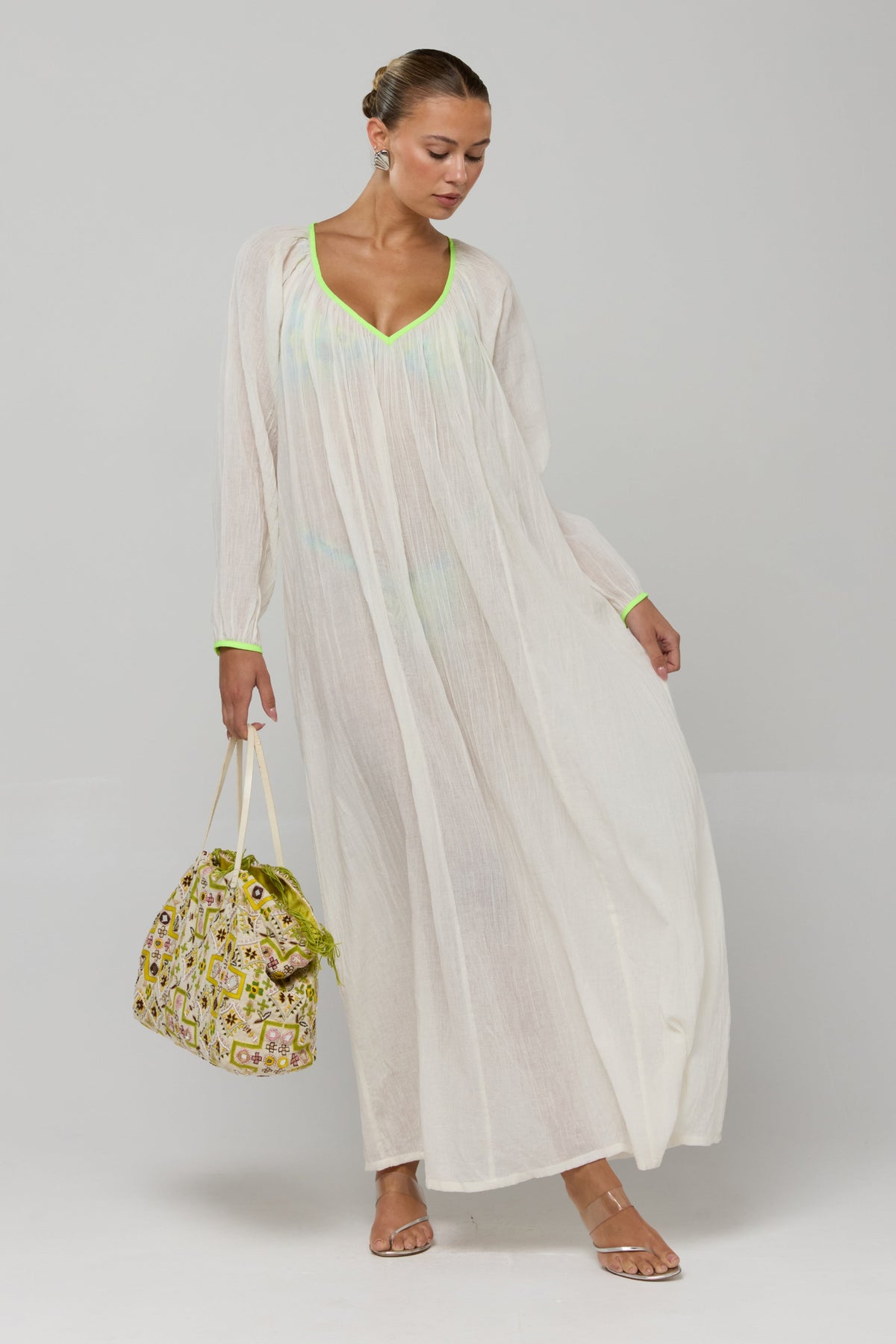 This is an image of Gaia Dress - RESA featuring a model wearing the dress