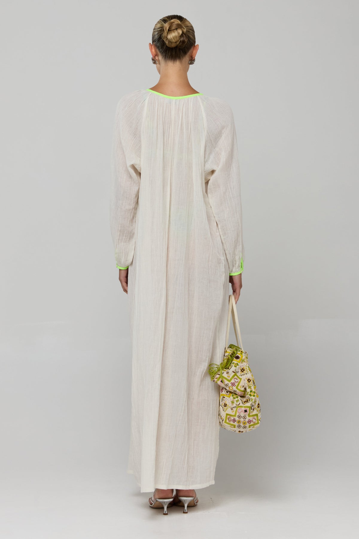 This is an image of Gaia Dress - RESA featuring a model wearing the dress