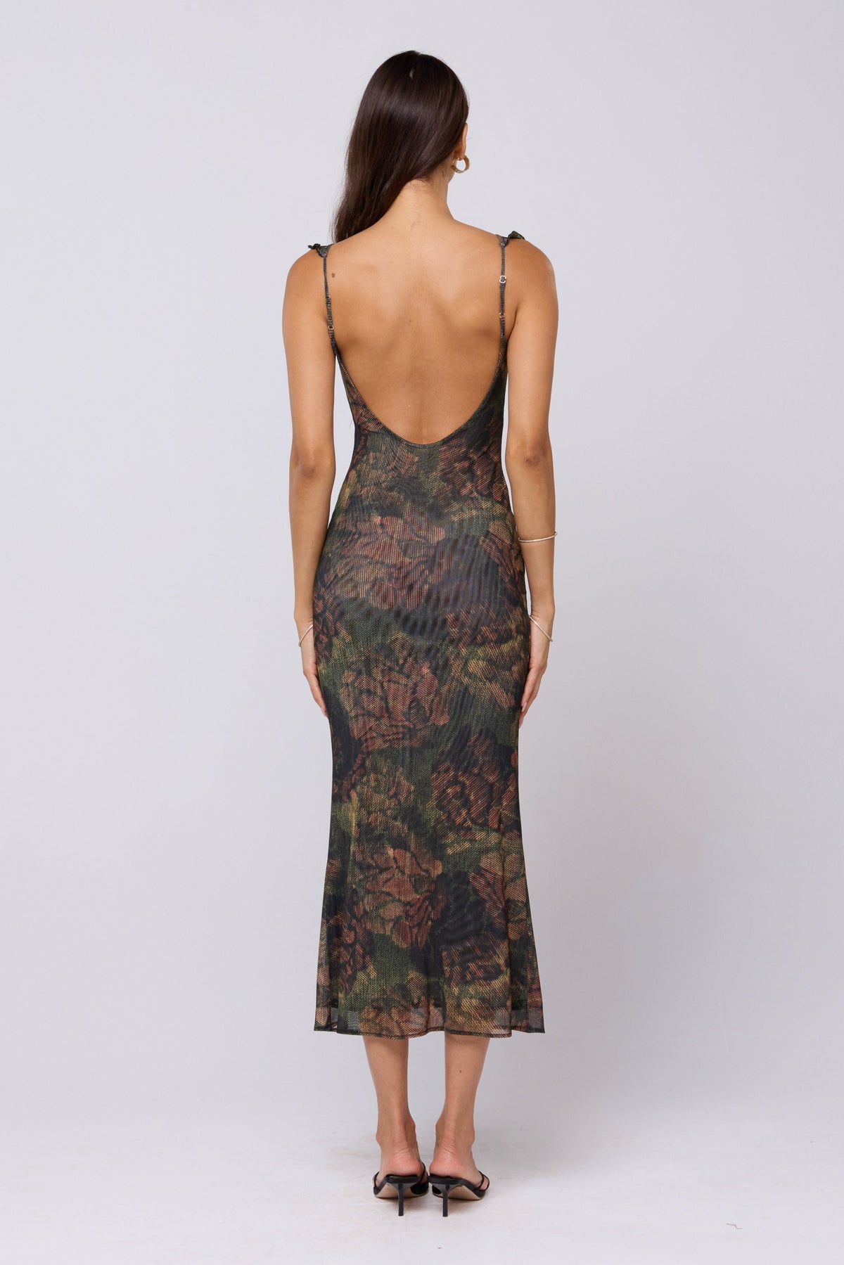 This is an image of Goldie Dress in Autumn - RESA featuring a model wearing the dress