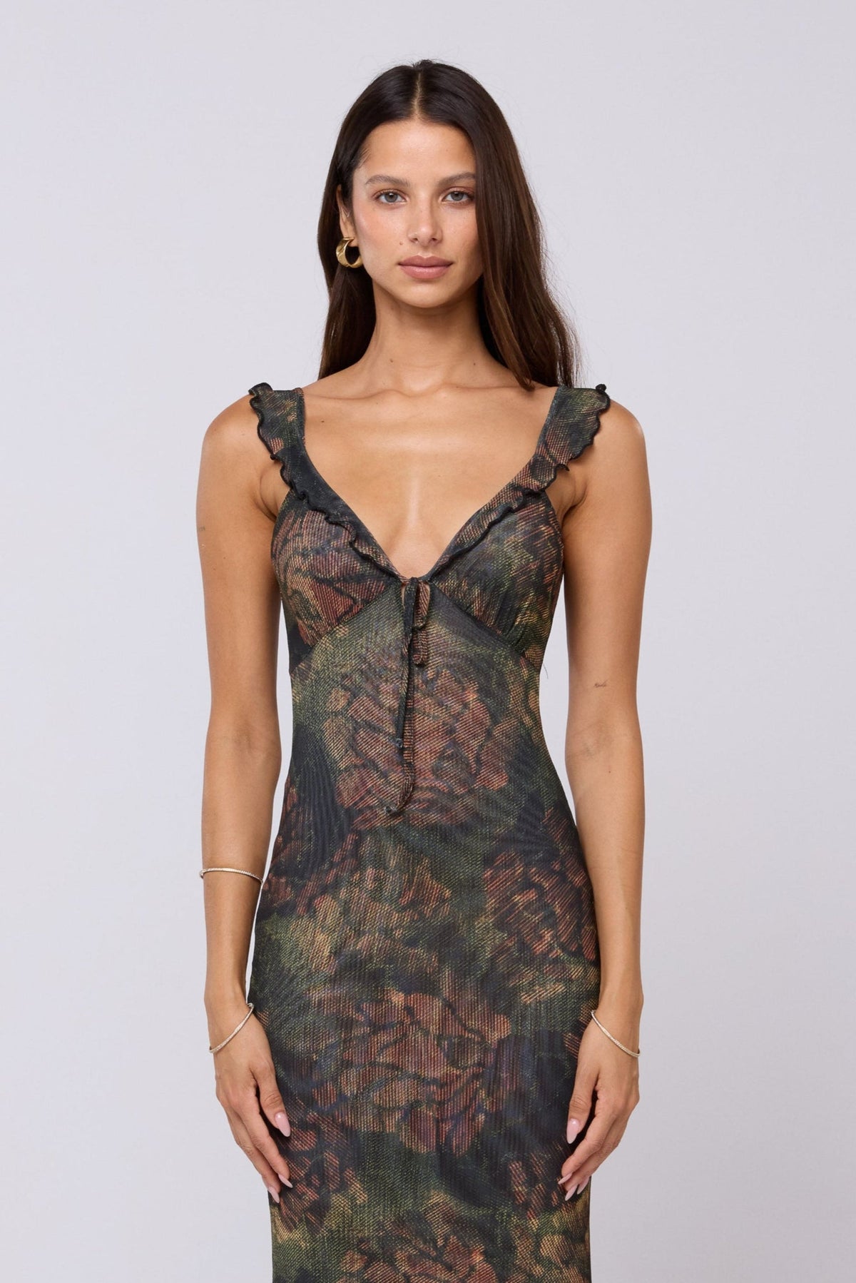 This is an image of Goldie Dress in Autumn - RESA featuring a model wearing the dress