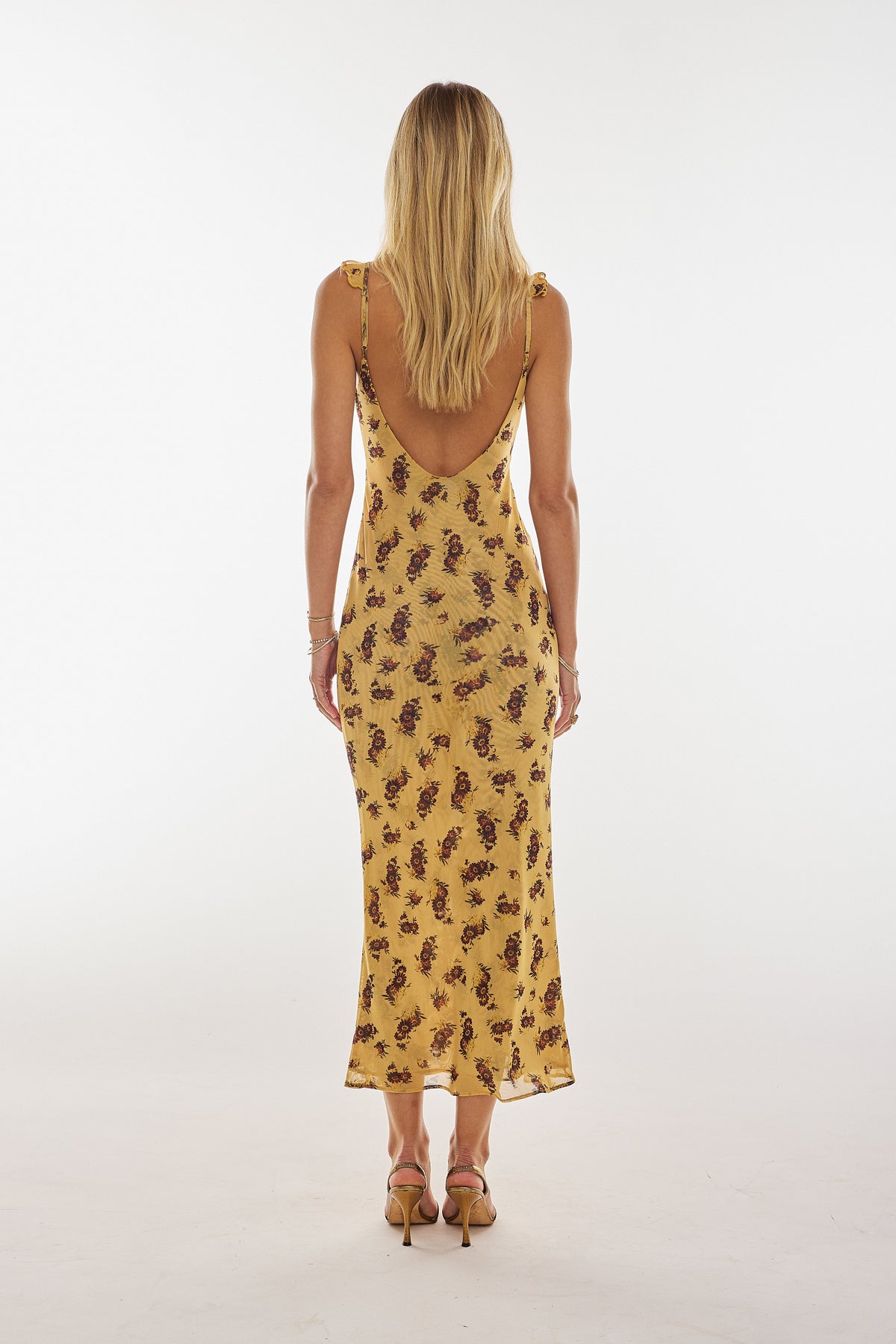 This is an image of Goldie Dress in Dandelion - RESA featuring a model wearing the dress