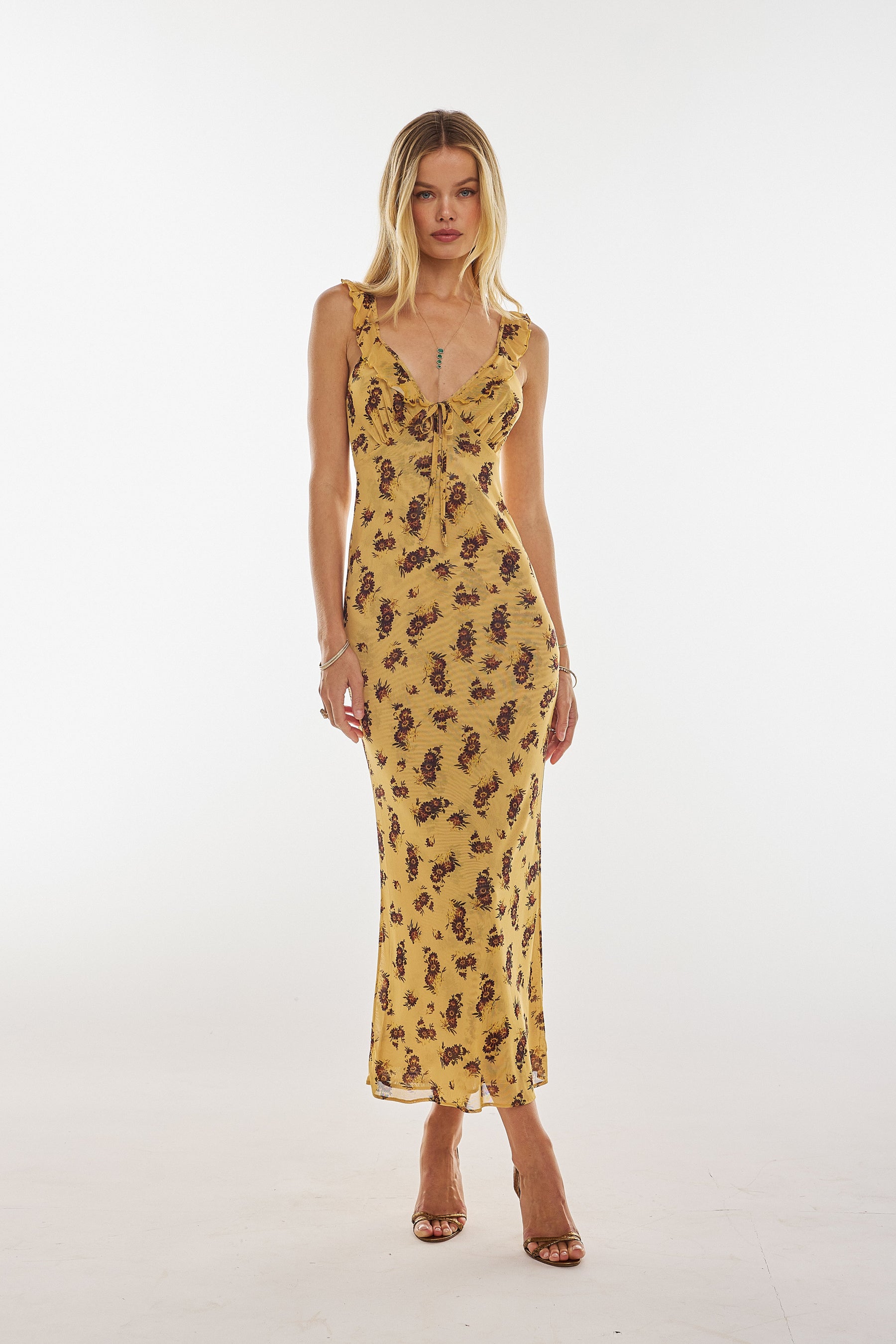 This is an image of Goldie Dress in Dandelion - RESA featuring a model wearing the dress