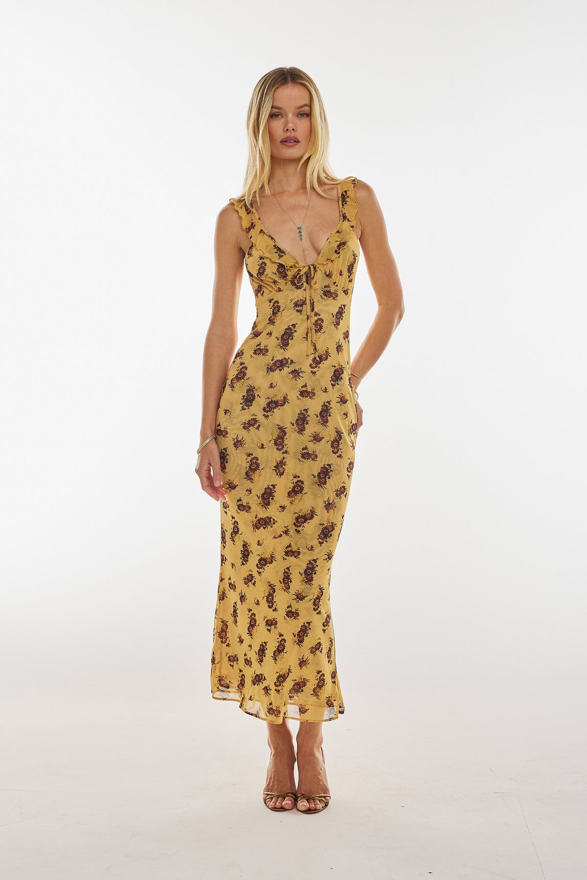 This is an image of Goldie Dress in Dandelion - RESA featuring a model wearing the dress