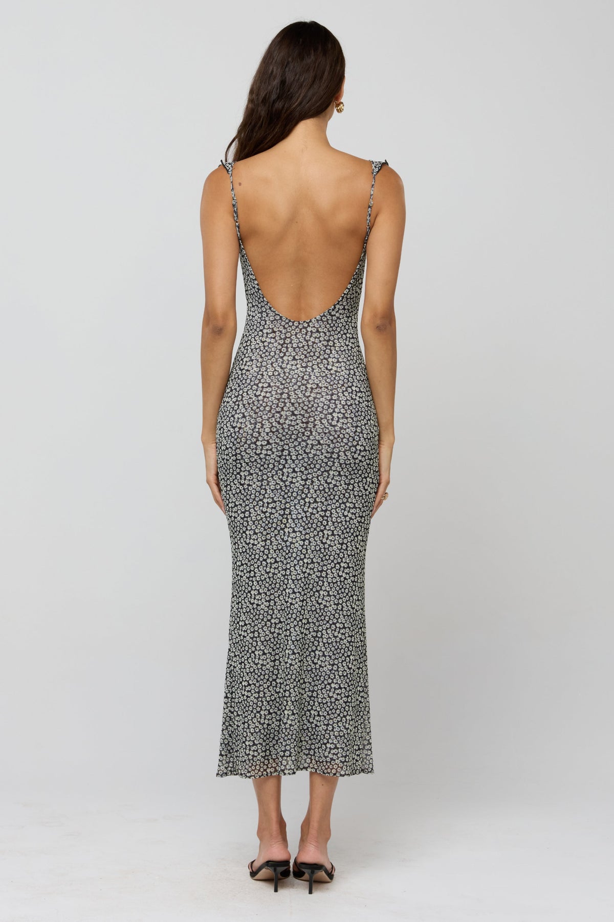This is an image of Goldie Dress in Flores - RESA featuring a model wearing the dress