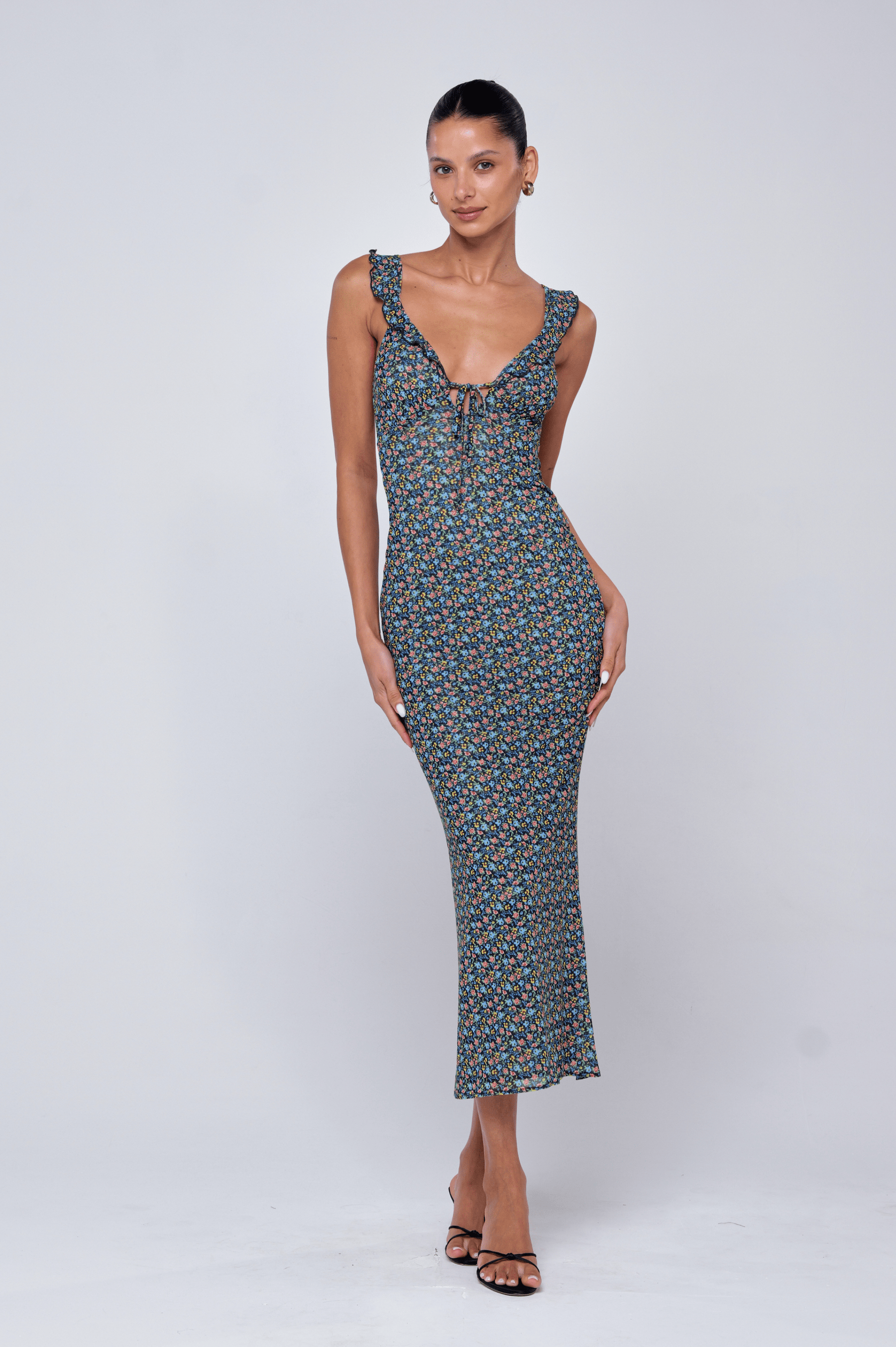 This is an image of Goldie Dress in Paros - RESA featuring a model wearing the dress