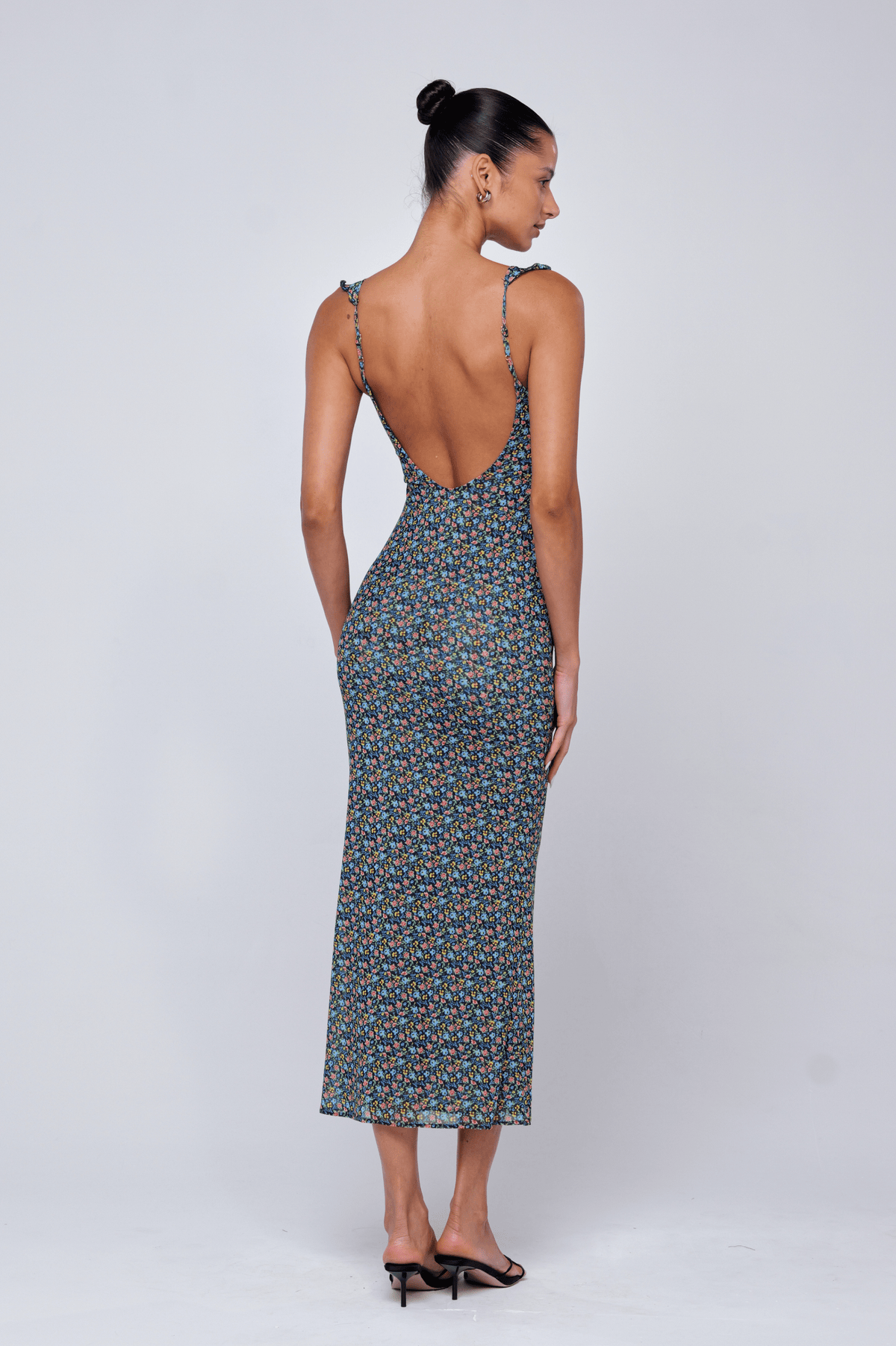 This is an image of Goldie Dress in Paros - RESA featuring a model wearing the dress