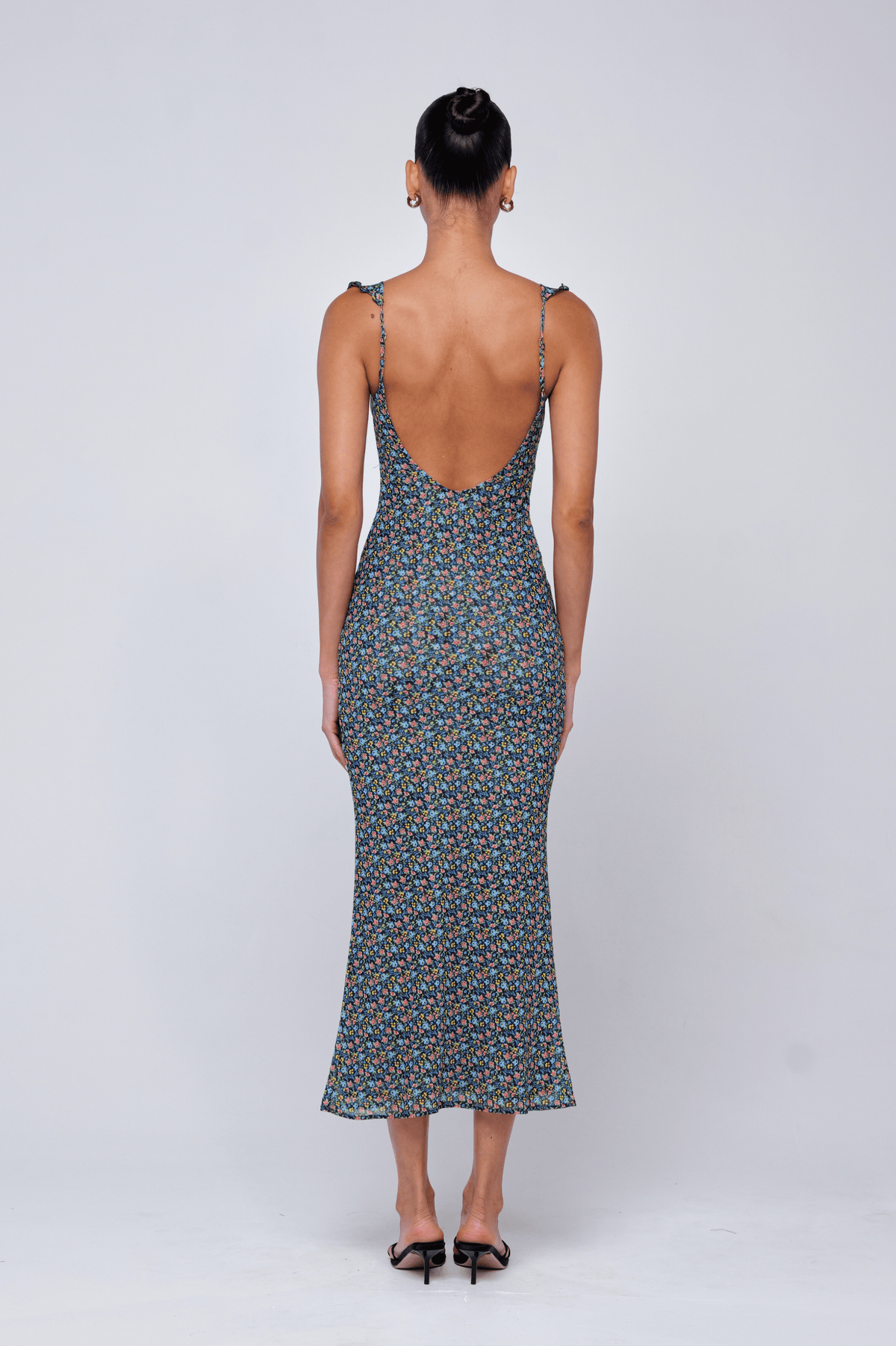 This is an image of Goldie Dress in Paros - RESA featuring a model wearing the dress