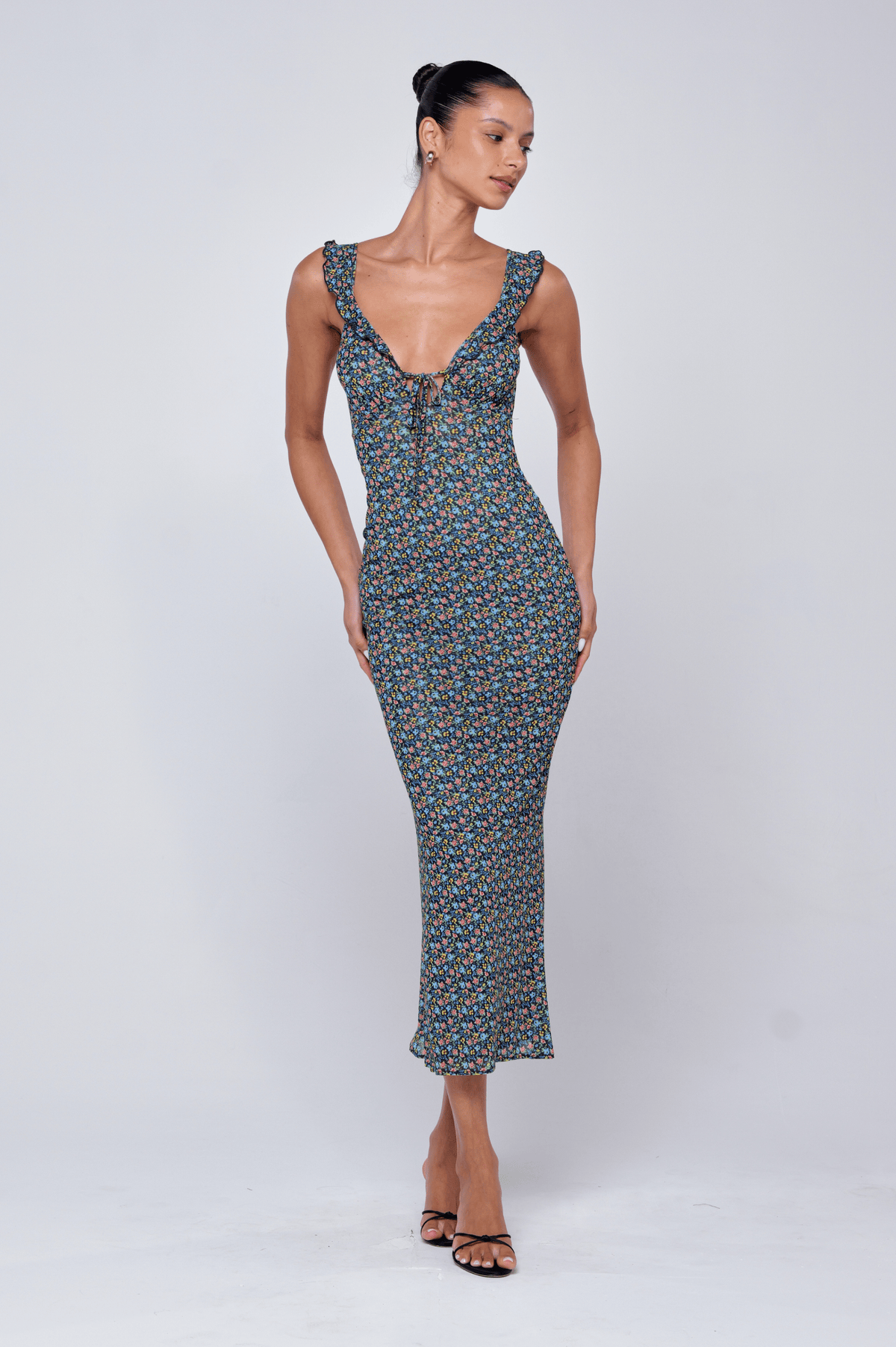 This is an image of Goldie Dress in Paros - RESA featuring a model wearing the dress