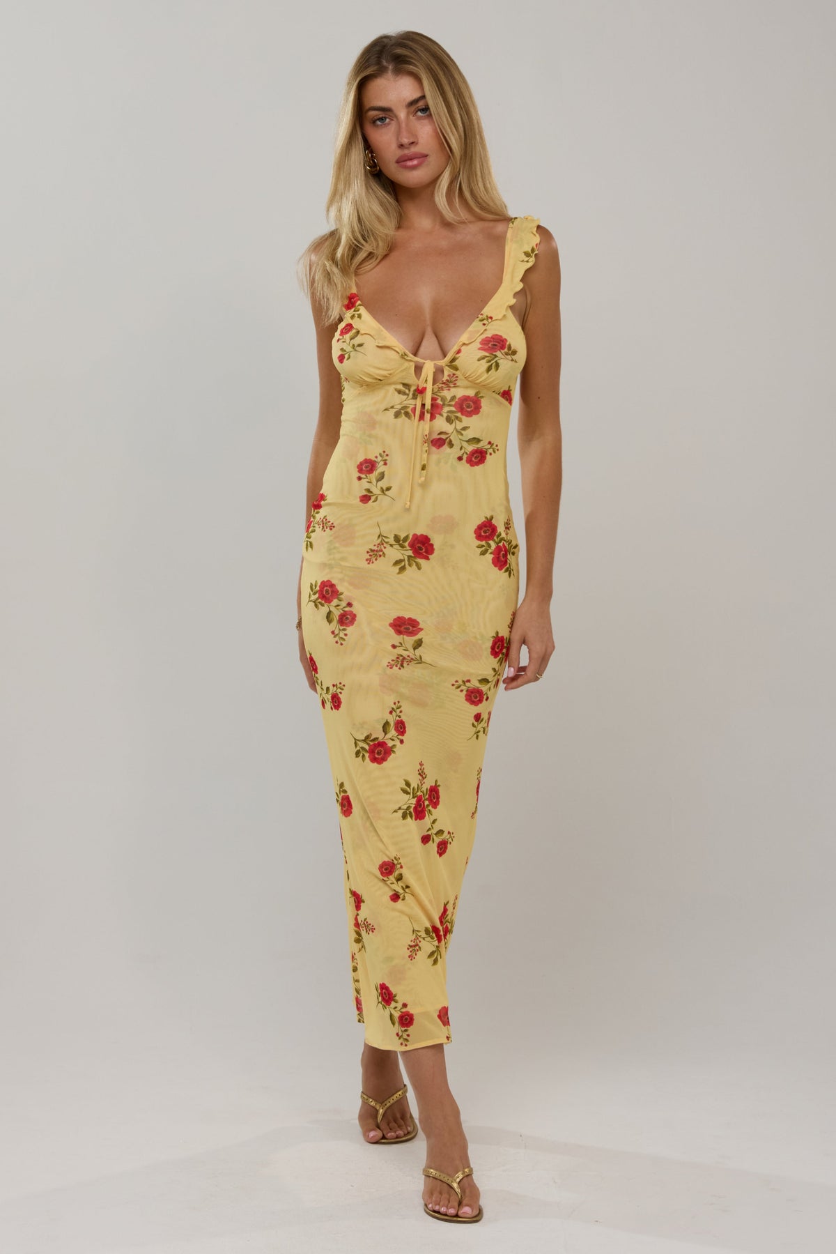 This is an image of Goldie in Saffron - RESA featuring a model wearing the dress