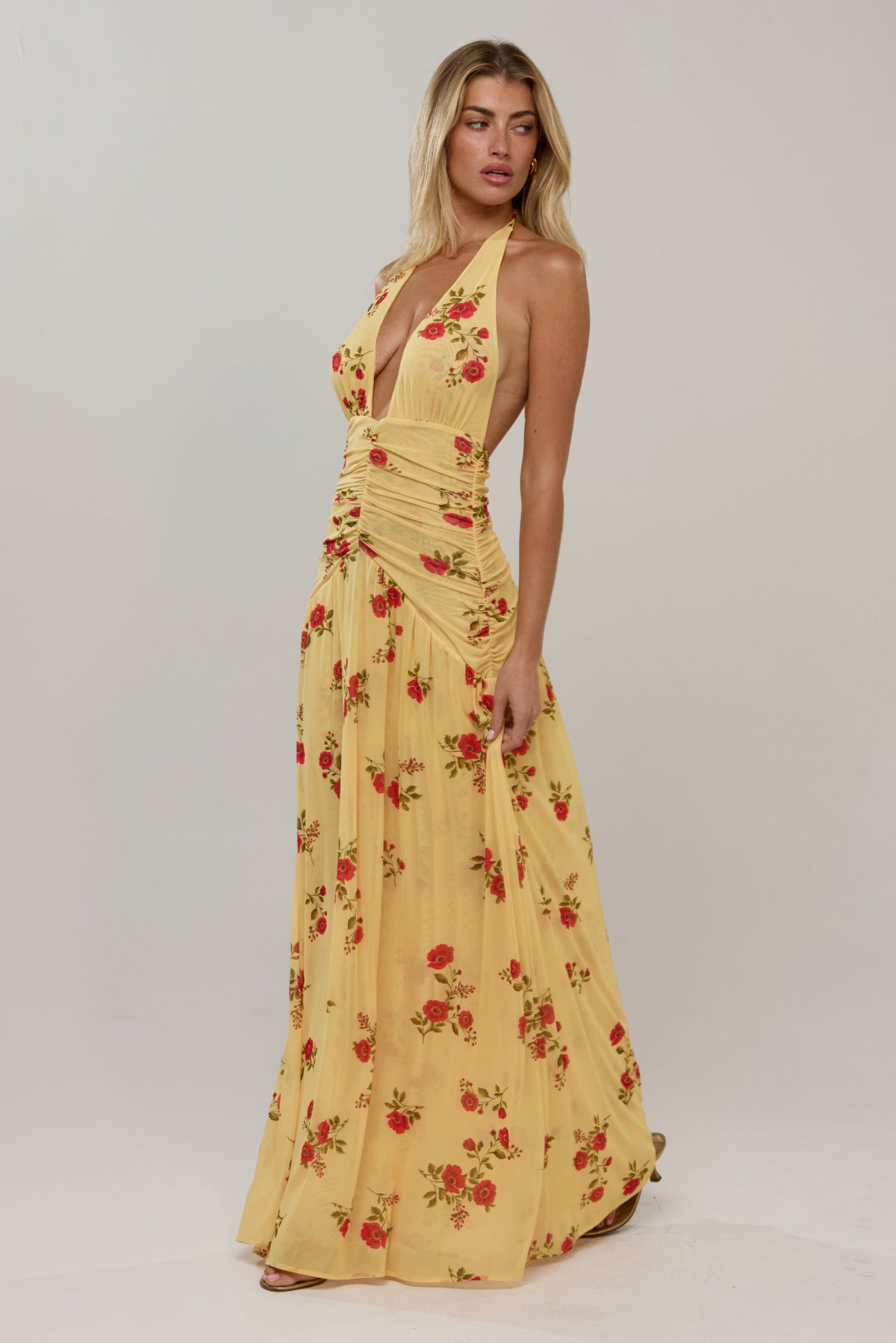 This is an image of Grace in Saffron - RESA featuring a model wearing the dress