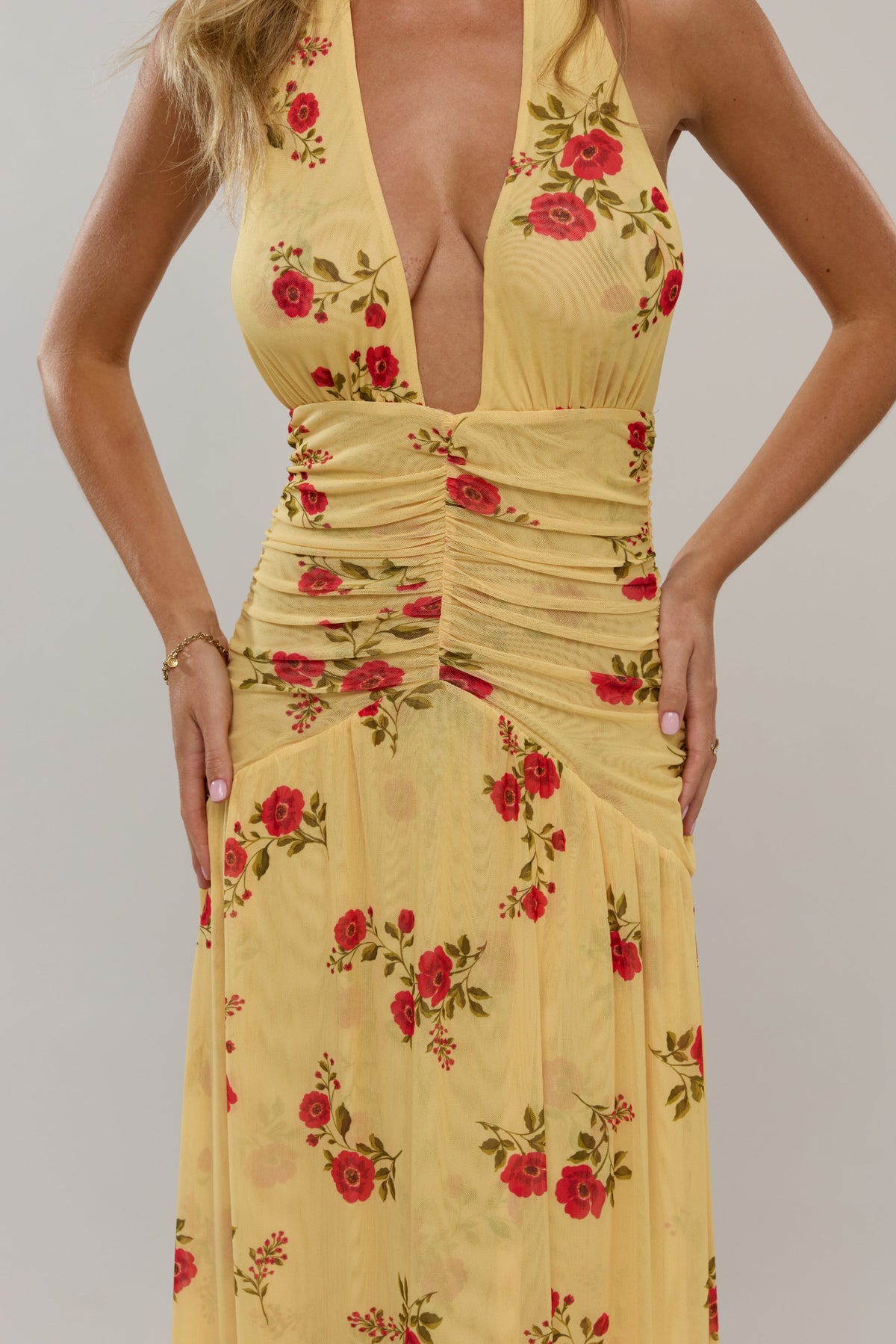 This is an image of Grace in Saffron - RESA featuring a model wearing the dress
