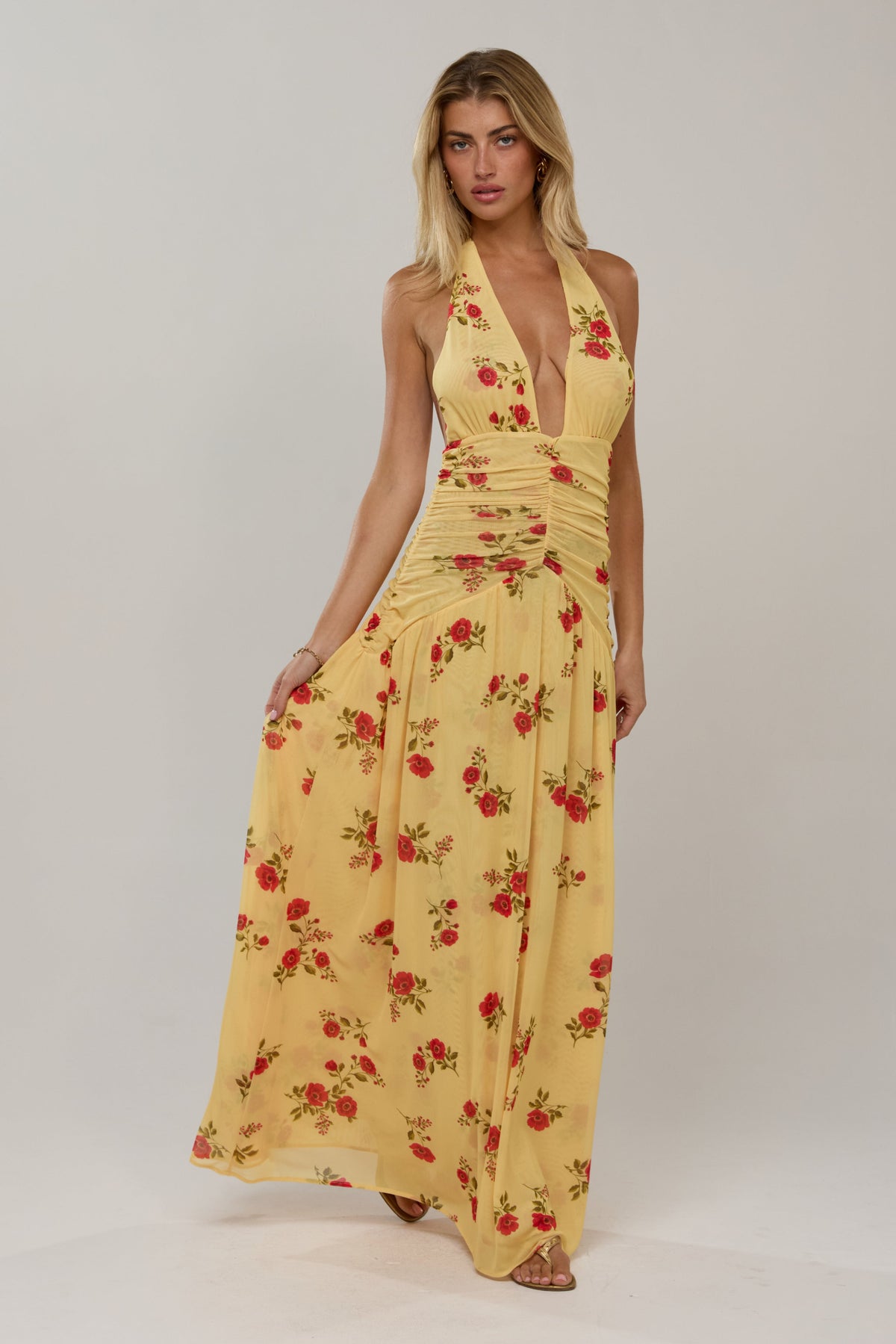 This is an image of Grace in Saffron - RESA featuring a model wearing the dress