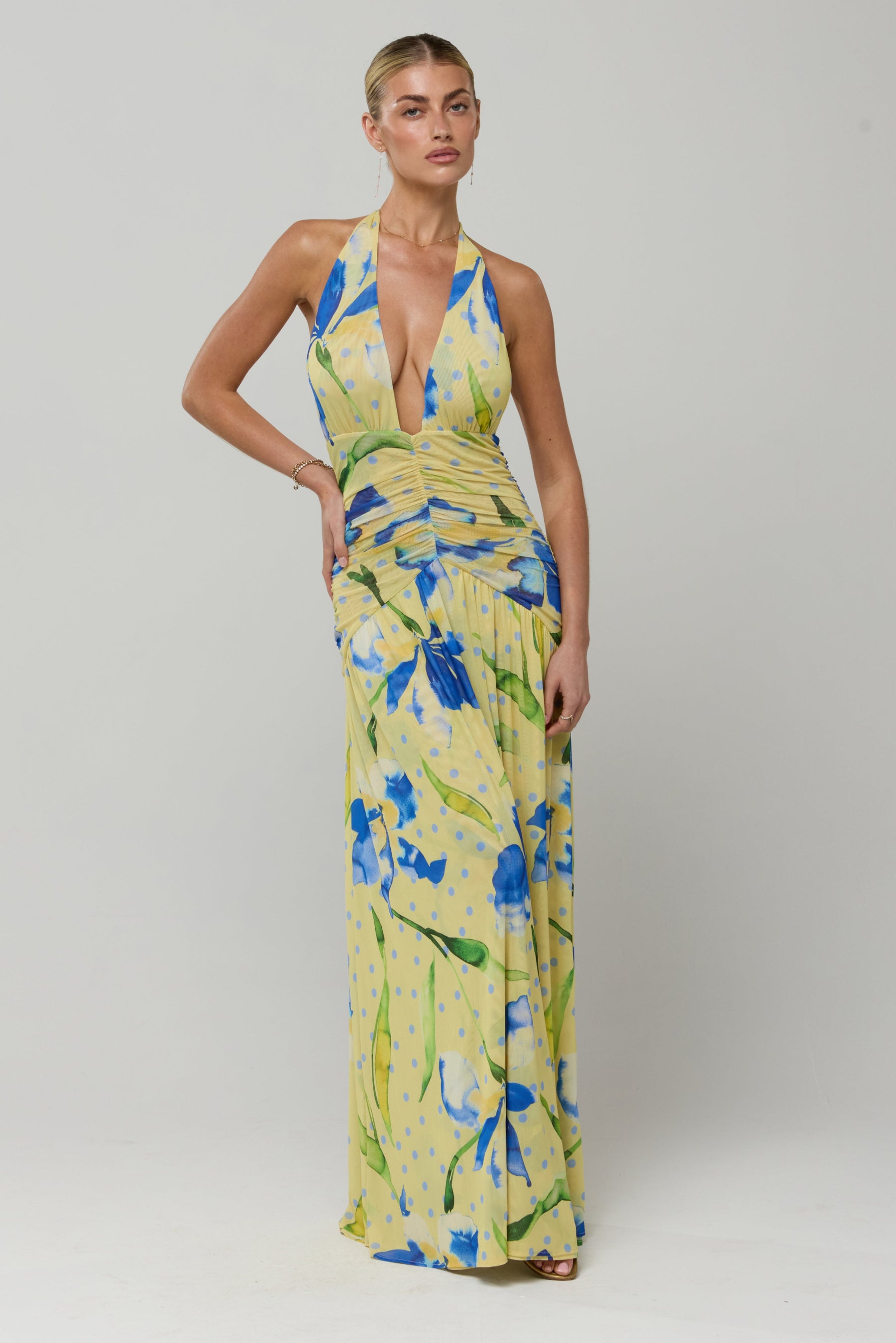 This is an image of Grace Maxi in Solei - RESA featuring a model wearing the dress