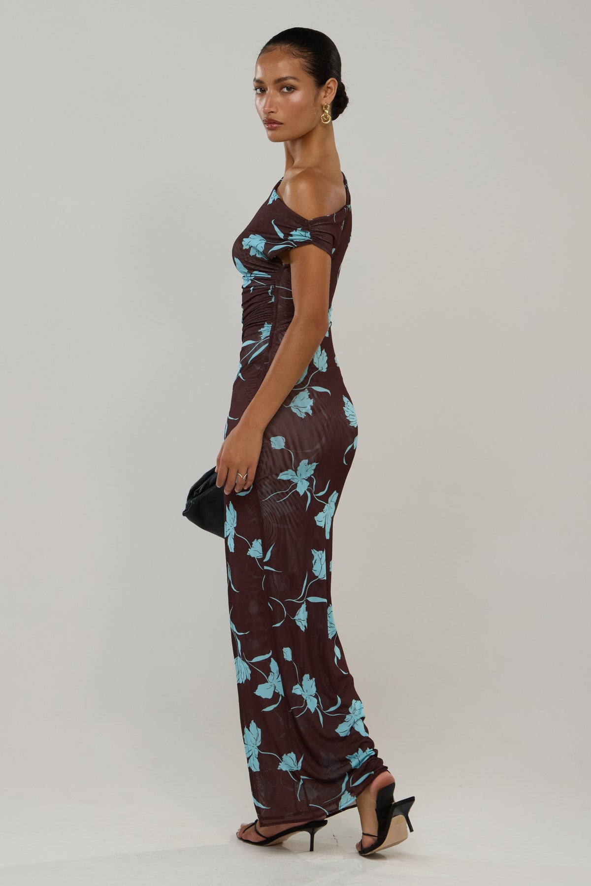 This is an image of Gwen Dress in Agave - RESA featuring a model wearing the dress