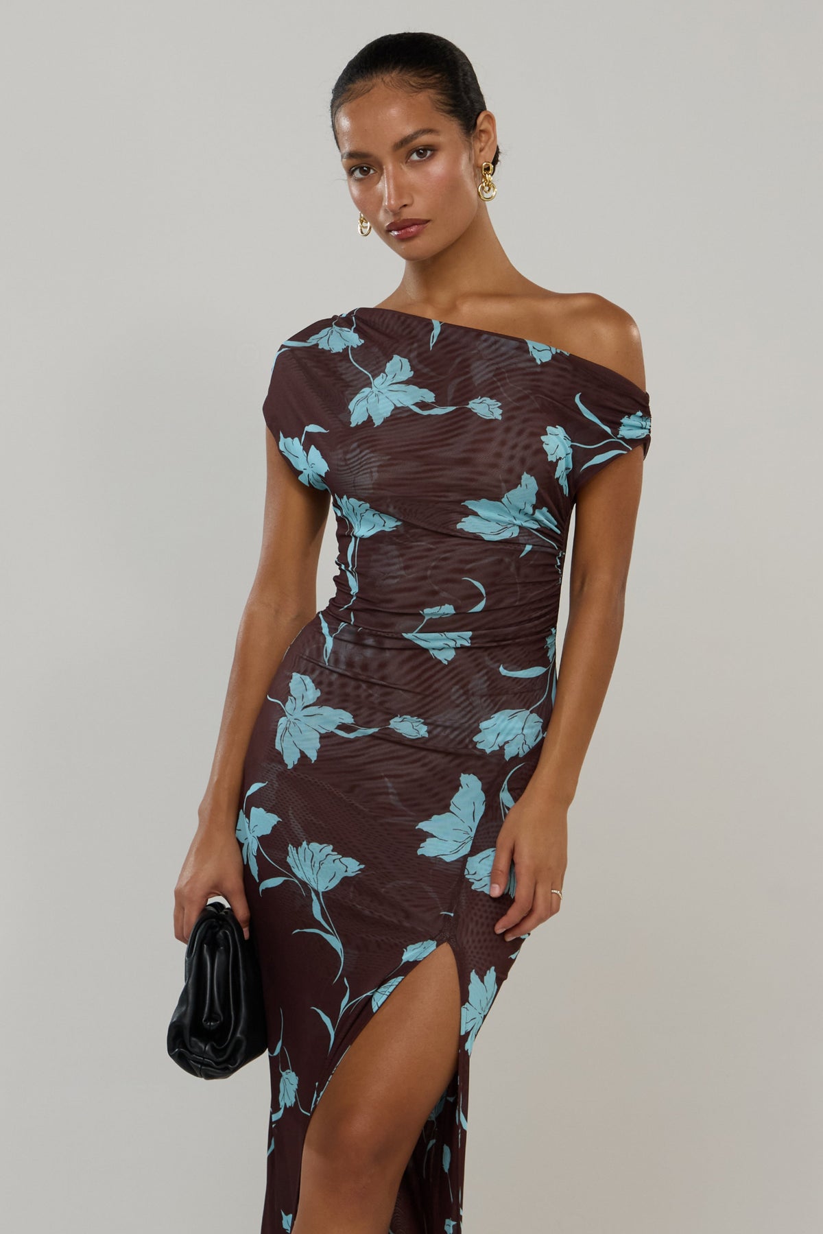 This is an image of Gwen Dress in Agave - RESA featuring a model wearing the dress